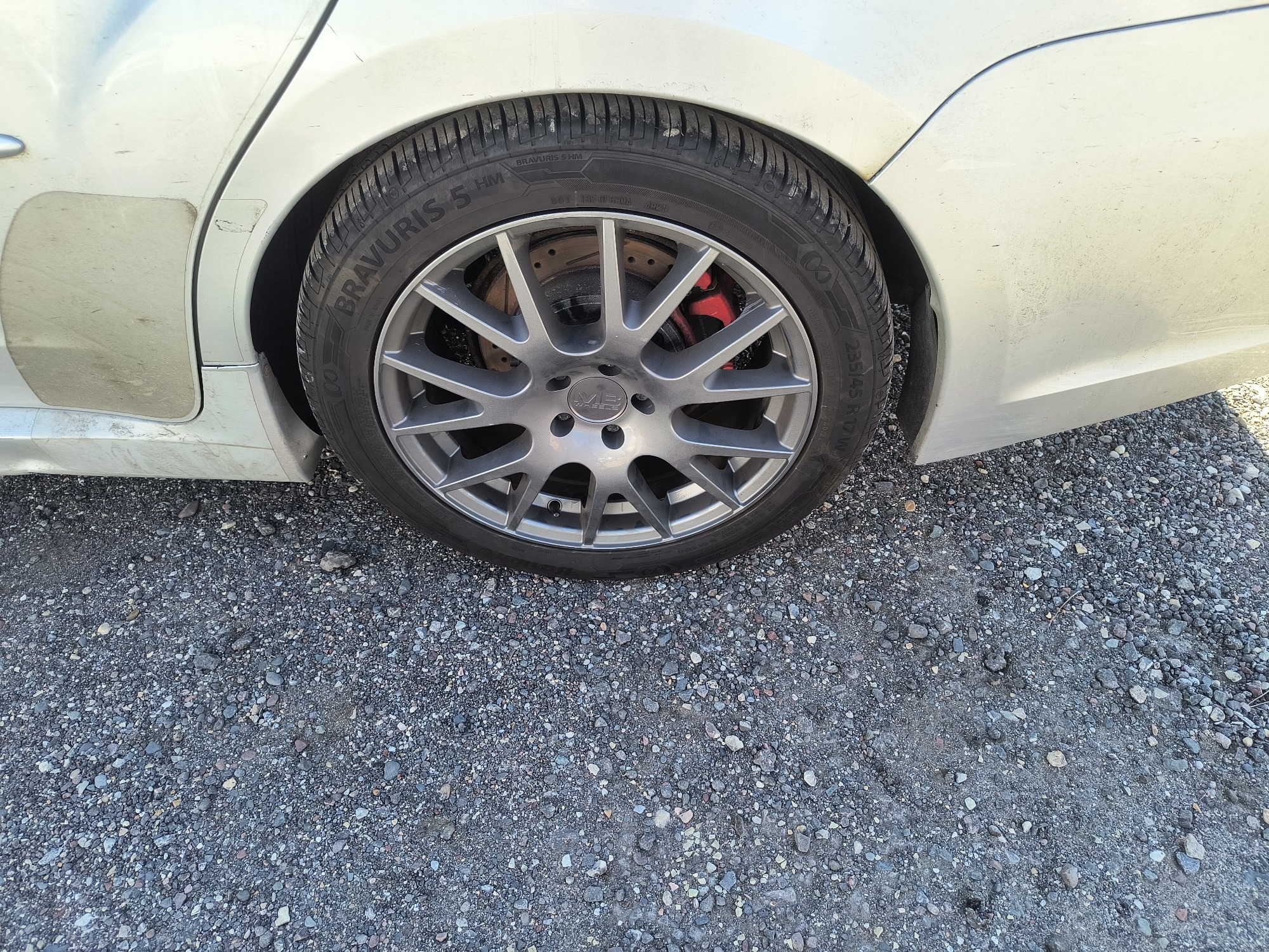 2011 subaru impreza-wrx 4-door with 128706 miles for sale near Elk River, Minnesota 106706_13_rear_drv_wheel.jpg