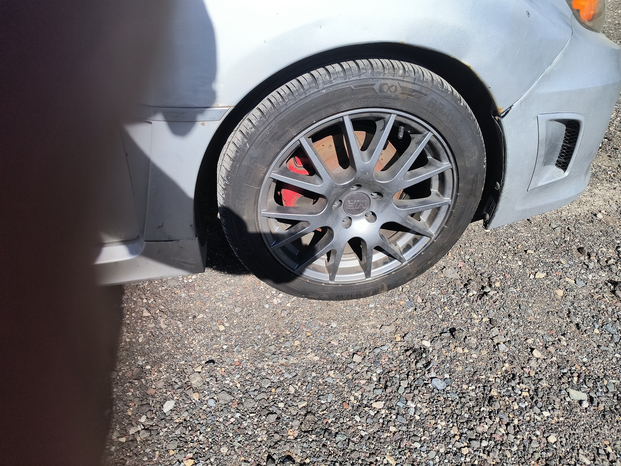 2011 subaru impreza-wrx 4-door with 128706 miles for sale near Elk River, Minnesota 106706_15_front_pass_wheel.jpg