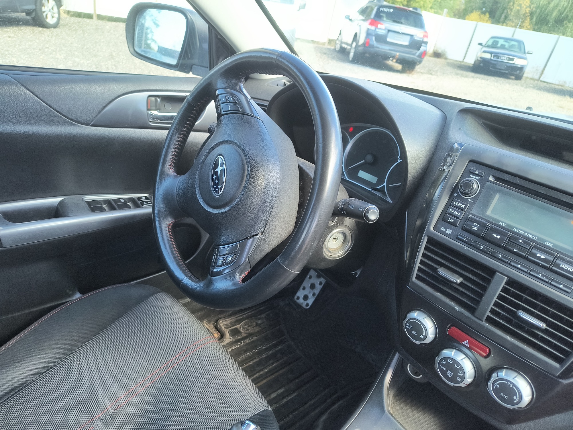 2011 subaru impreza-wrx 4-door with 128706 miles for sale near Elk River, Minnesota 106706_36_steering_wheel.jpg
