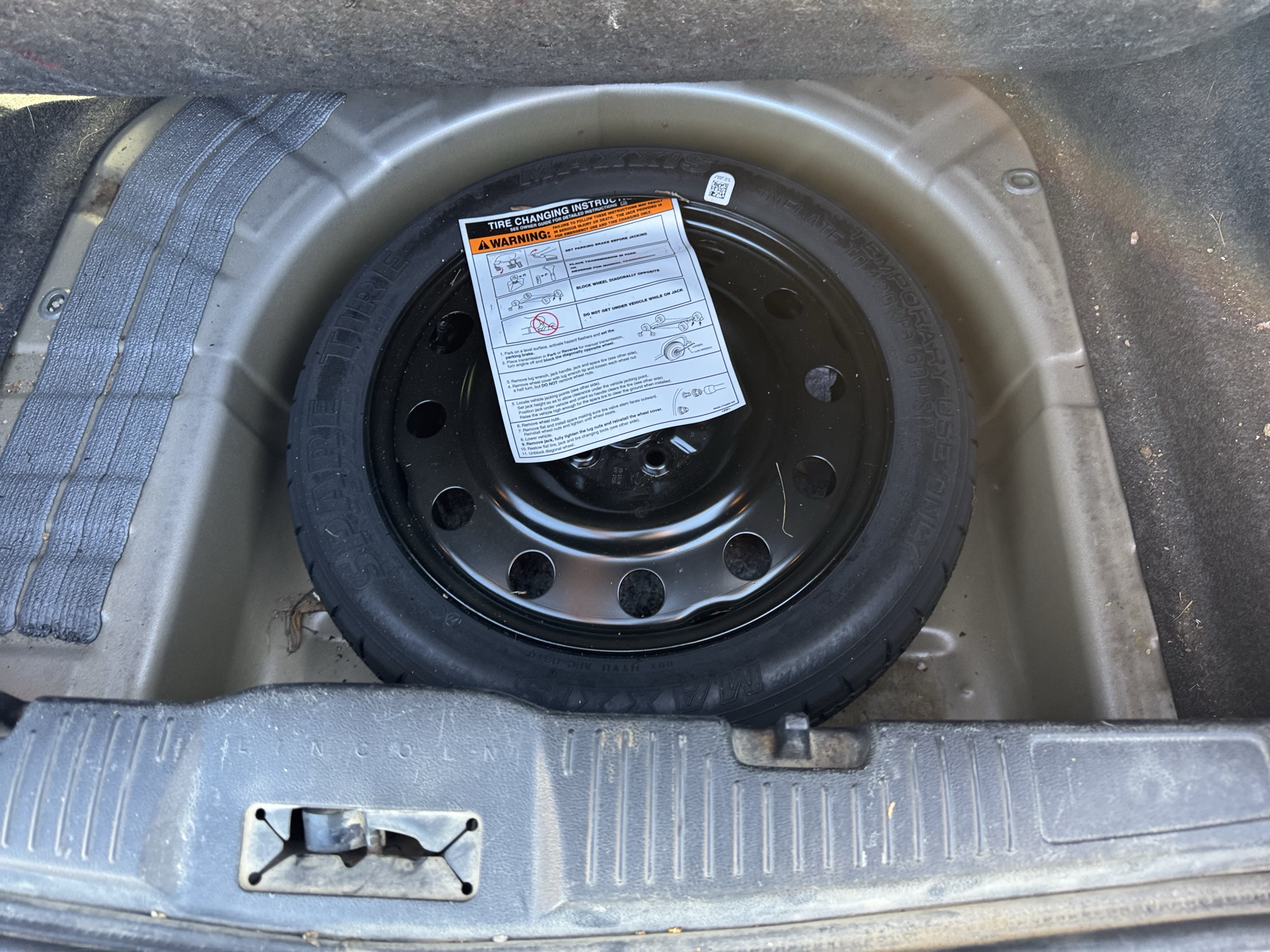 2010 lincoln mks 3.7l-fwd with 233502 miles for sale near Elk River, Minnesota 106714_27_spare_tire.jpg