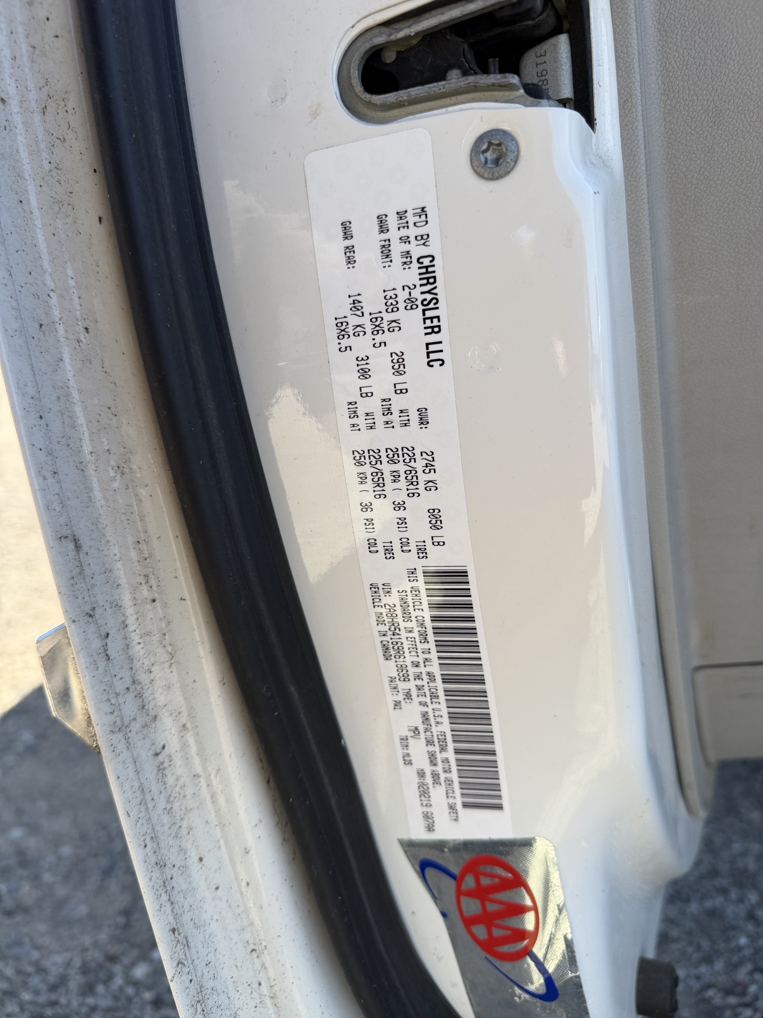 2009 chrysler town-and-country touring with 156827 miles for sale near Elk River, Minnesota 106715_47_door_vin_sticker.jpg