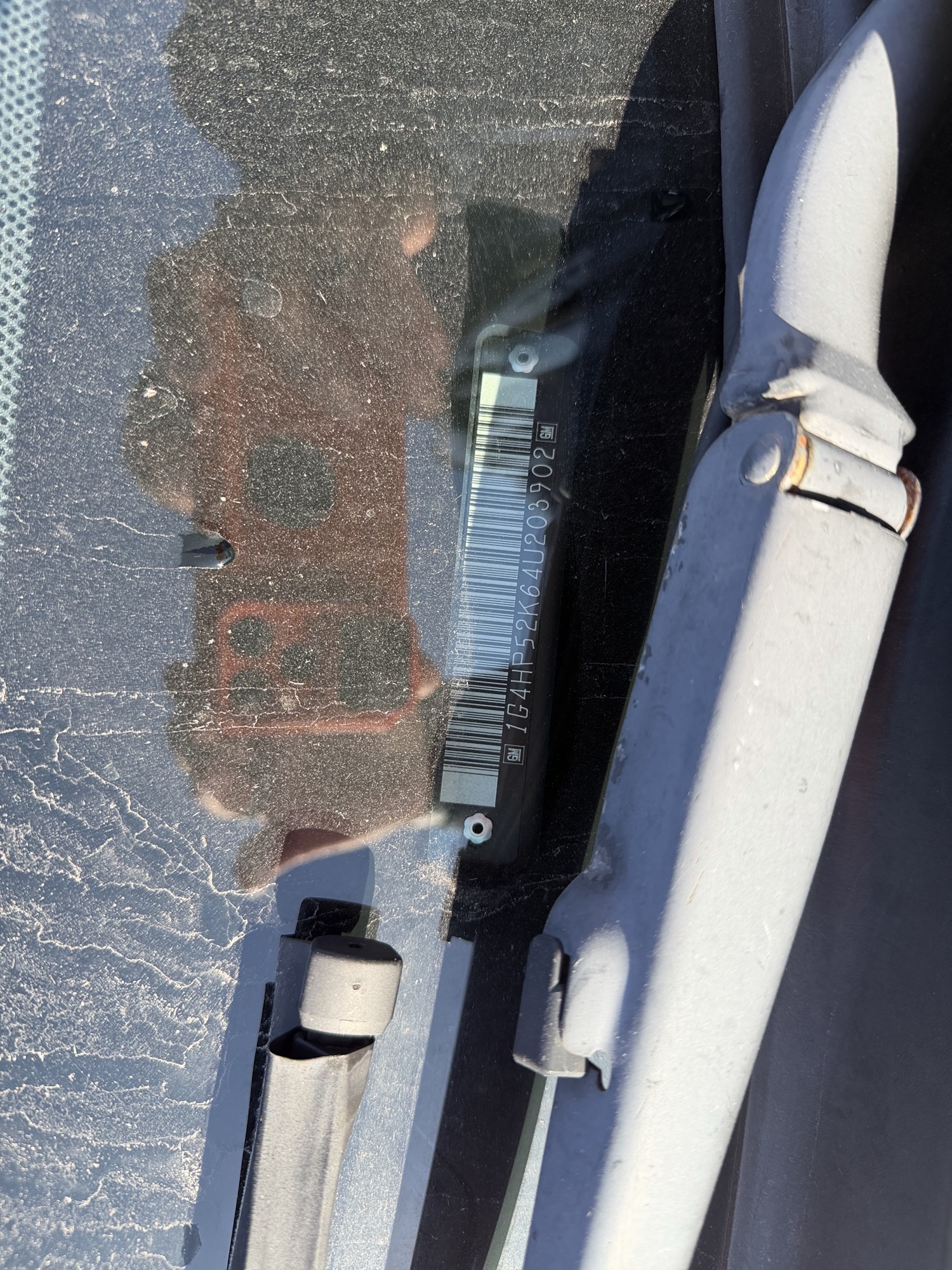 2004 buick lesabre custom with 243841 miles for sale near Elk River, Minnesota 106716_48_windshield_vin_plate.jpg
