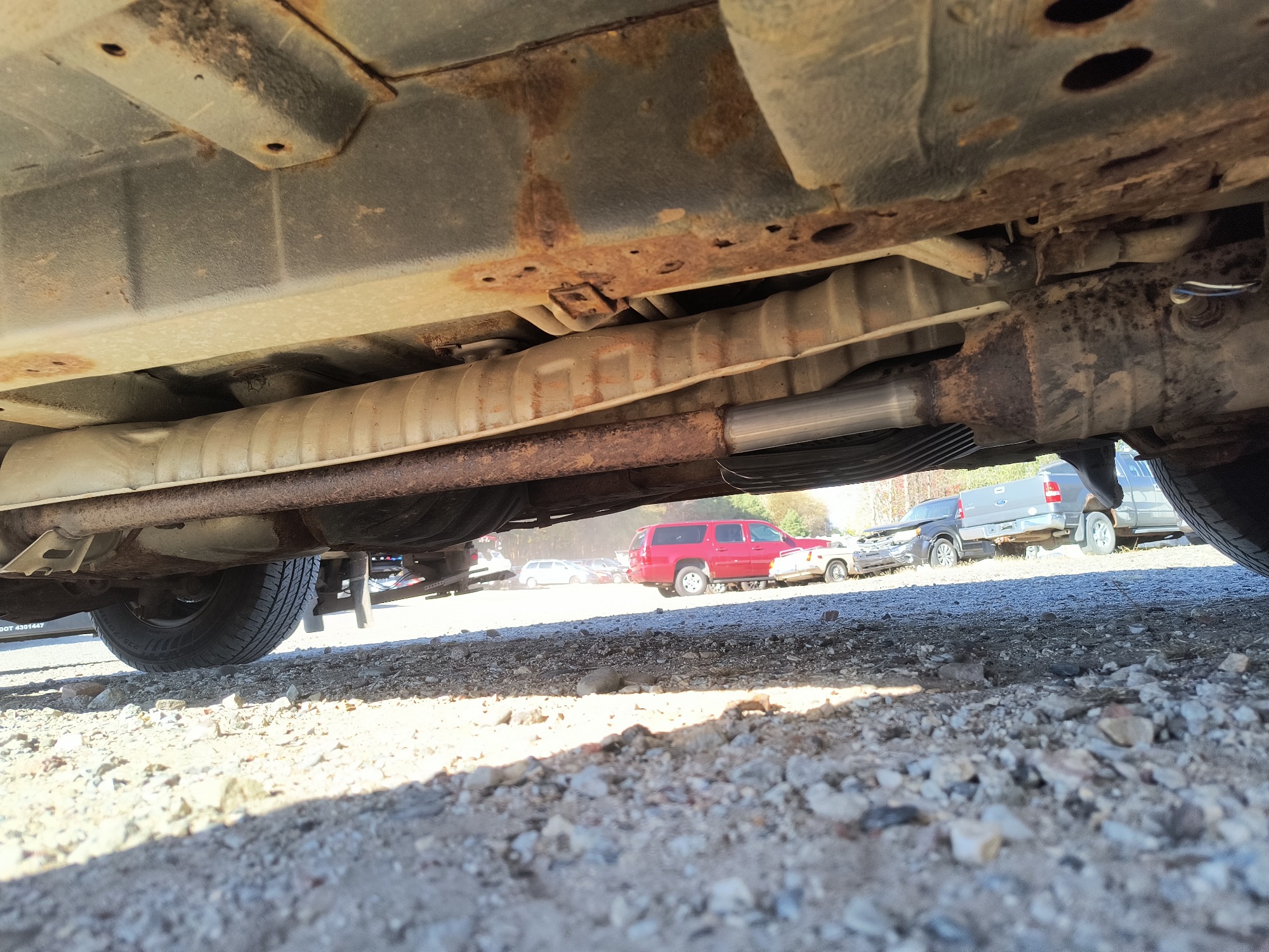 2003 honda pilot ex-w--leather with 296887 miles for sale near Elk River, Minnesota 106717_21_undercar_pass_side.jpg