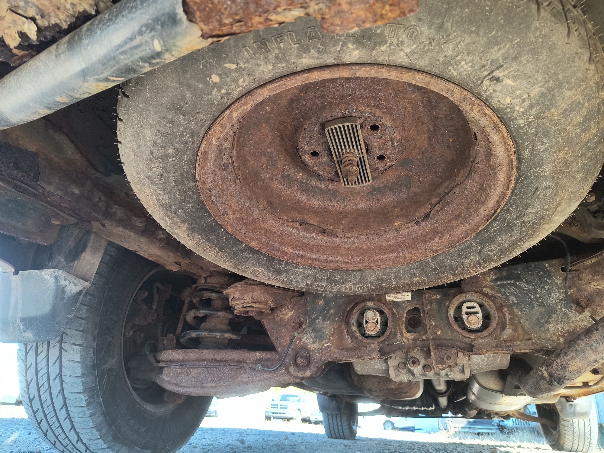2003 honda pilot ex-w--leather with 296887 miles for sale near Elk River, Minnesota 106717_27_spare_tire.jpg