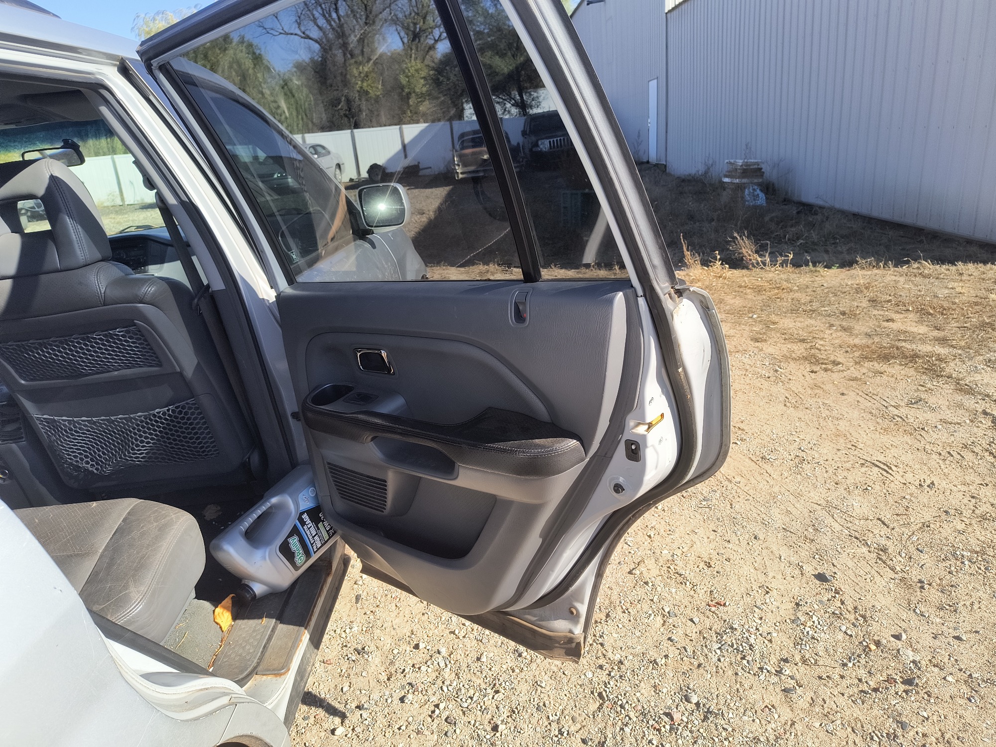 2003 honda pilot ex-w--leather with 296887 miles for sale near Elk River, Minnesota 106717_30_pass_rear_door_panel.jpg