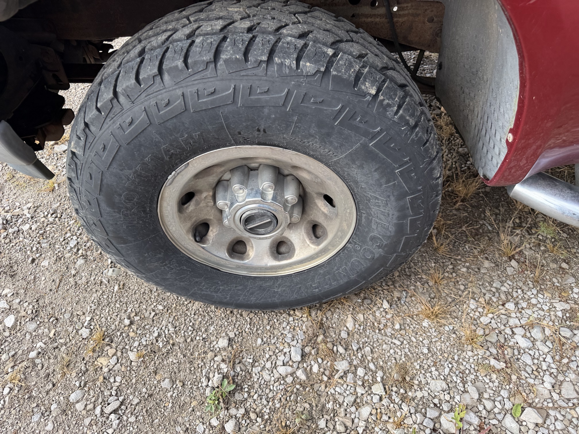 2003 ford f-350-sd xl-supercab-4wd with 175726 miles for sale near St. Louis, Missouri 106734_12_drv_front_wheel.jpg