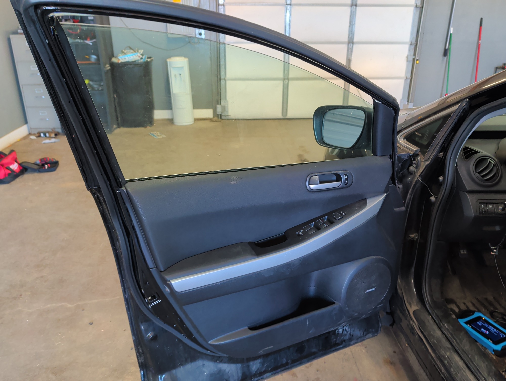 2009 mazda cx-7 grand-touring-fwd with 144847 miles for sale near Elk River, Minnesota 106742_23_driver_door_panel.jpg