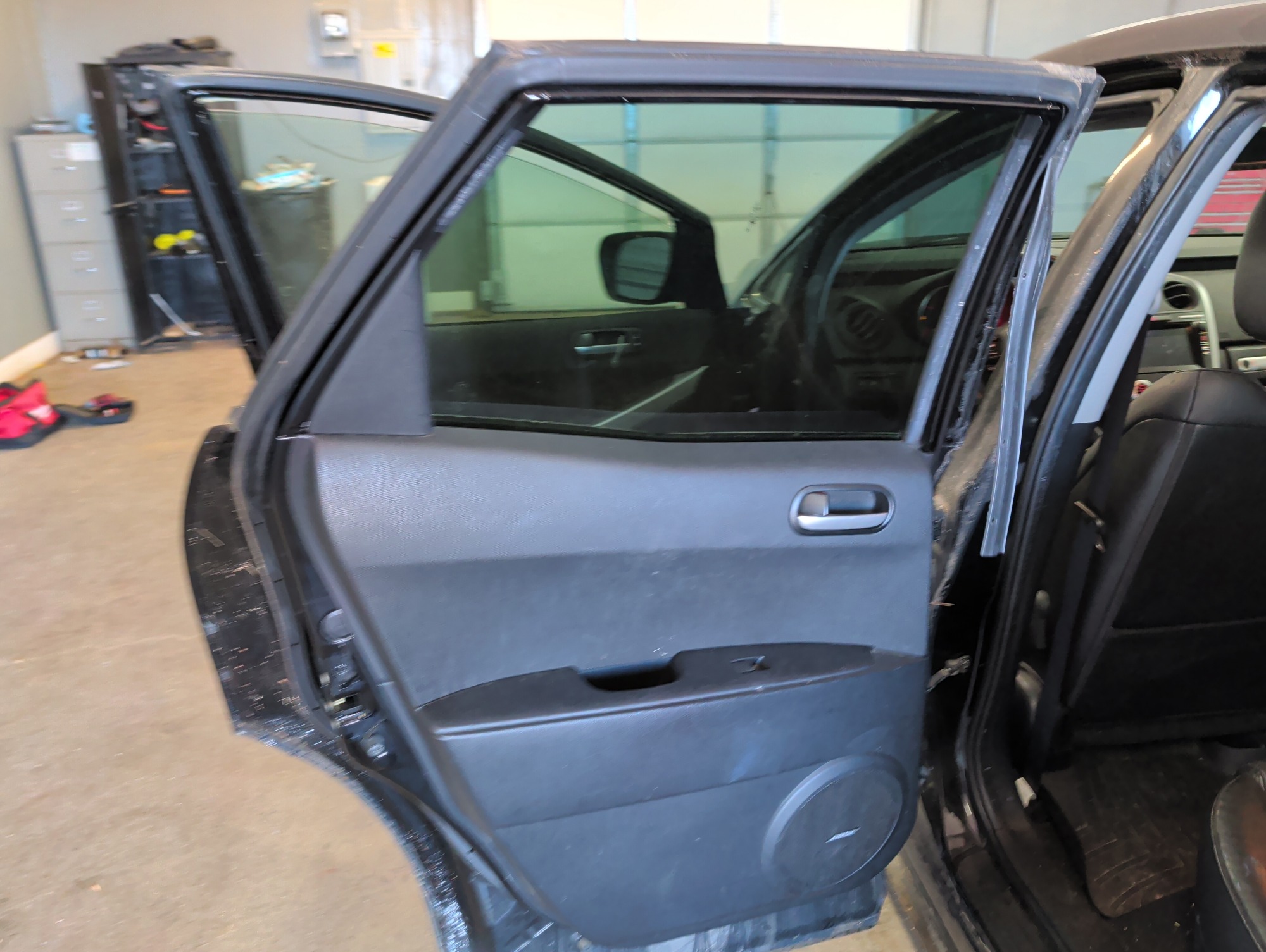 2009 mazda cx-7 grand-touring-fwd with 144847 miles for sale near Elk River, Minnesota 106742_25_drv_rear_door_panel.jpg