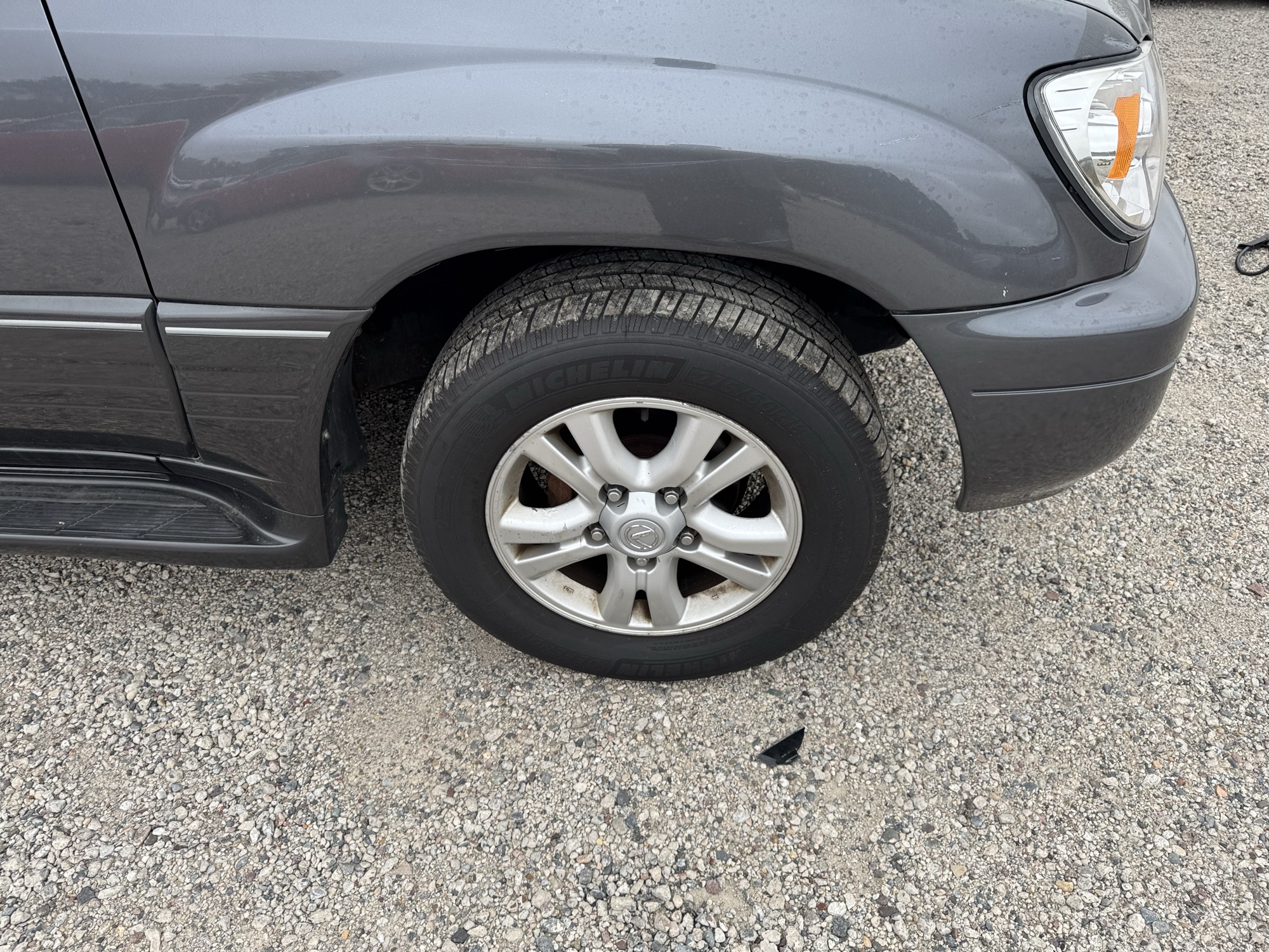 2004 lexus lx-470 sport-utility with 318395 miles for sale near Elk River, Minnesota 106745_15_front_pass_wheel.jpg