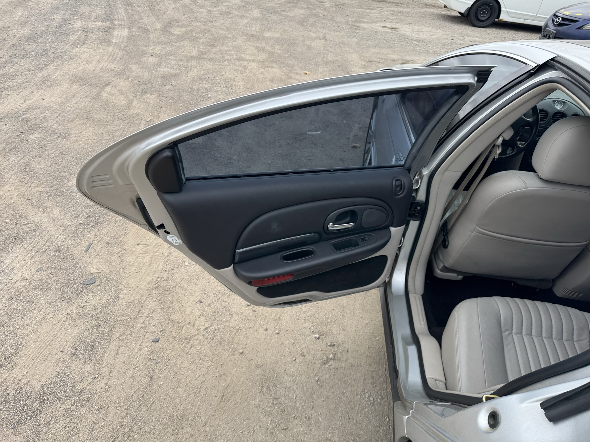 2002 chrysler 300m special with 71521 miles for sale near Elk River, Minnesota 106749_25_drv_rear_door_panel.jpg