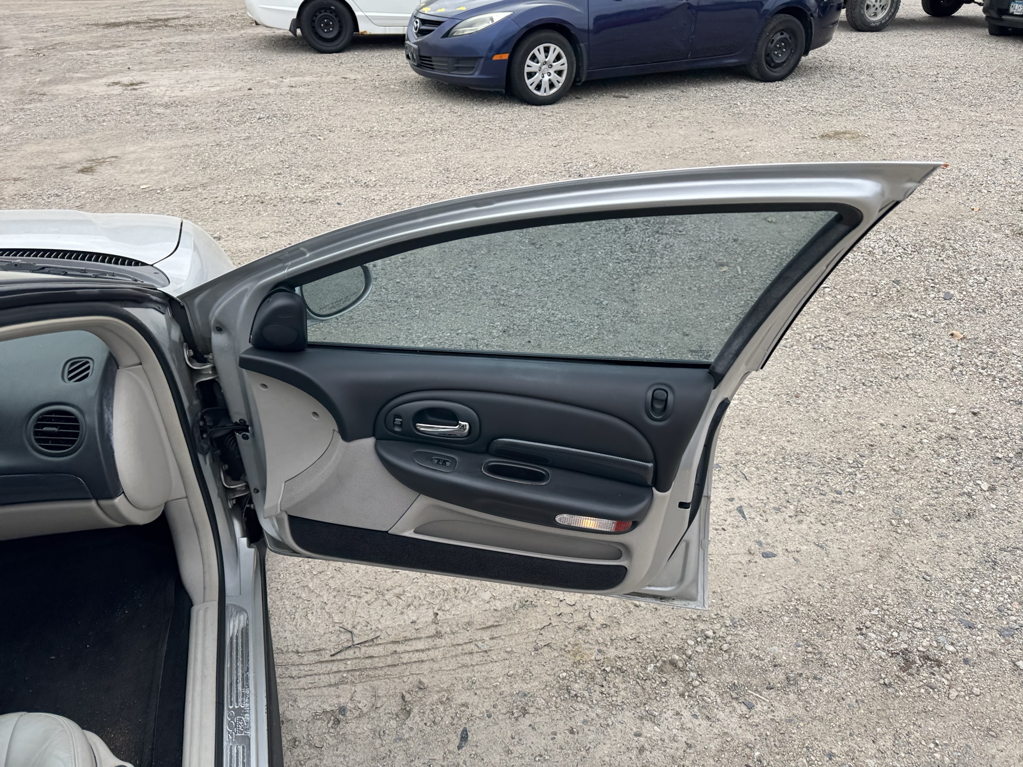 2002 chrysler 300m special with 71521 miles for sale near Elk River, Minnesota 106749_32_passenger_door_panel.jpg