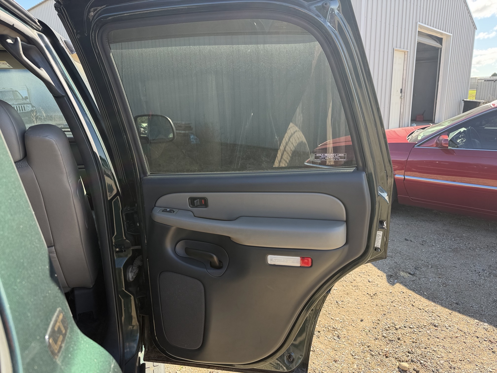 2001 chevrolet tahoe 4wd for sale near Elk River, Minnesota 106754_30_pass_rear_door_panel.jpg