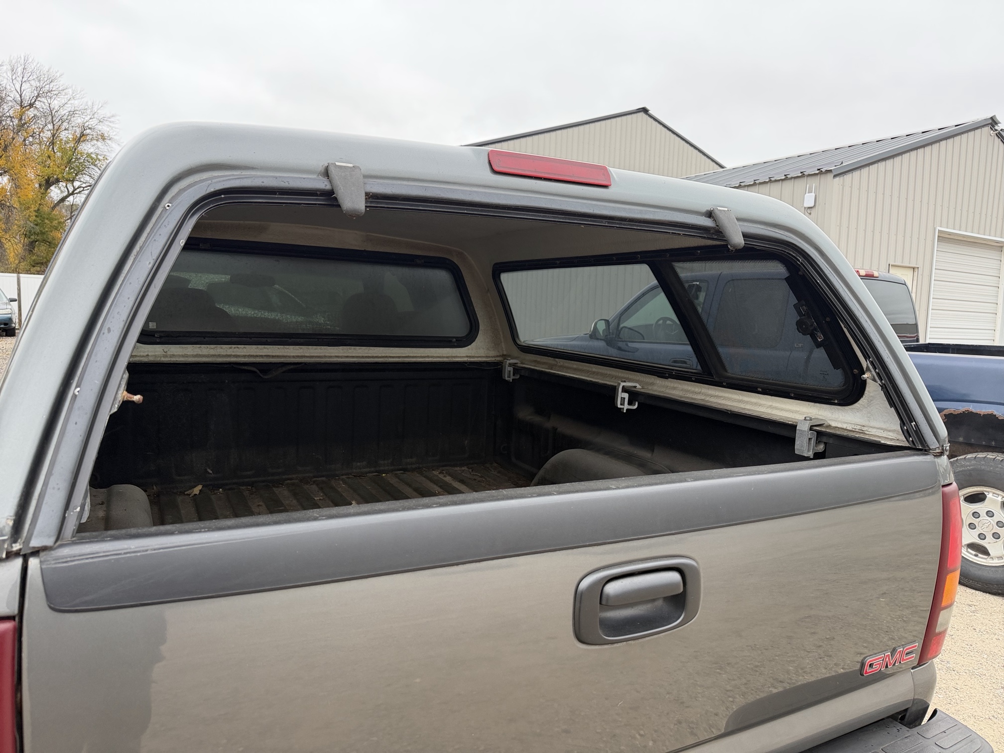 2002 gmc sierra-1500 sl-ext.-cab-short-bed-4wd with 83587 miles for sale near Elk River, Minnesota 106764_10_back_window.jpg