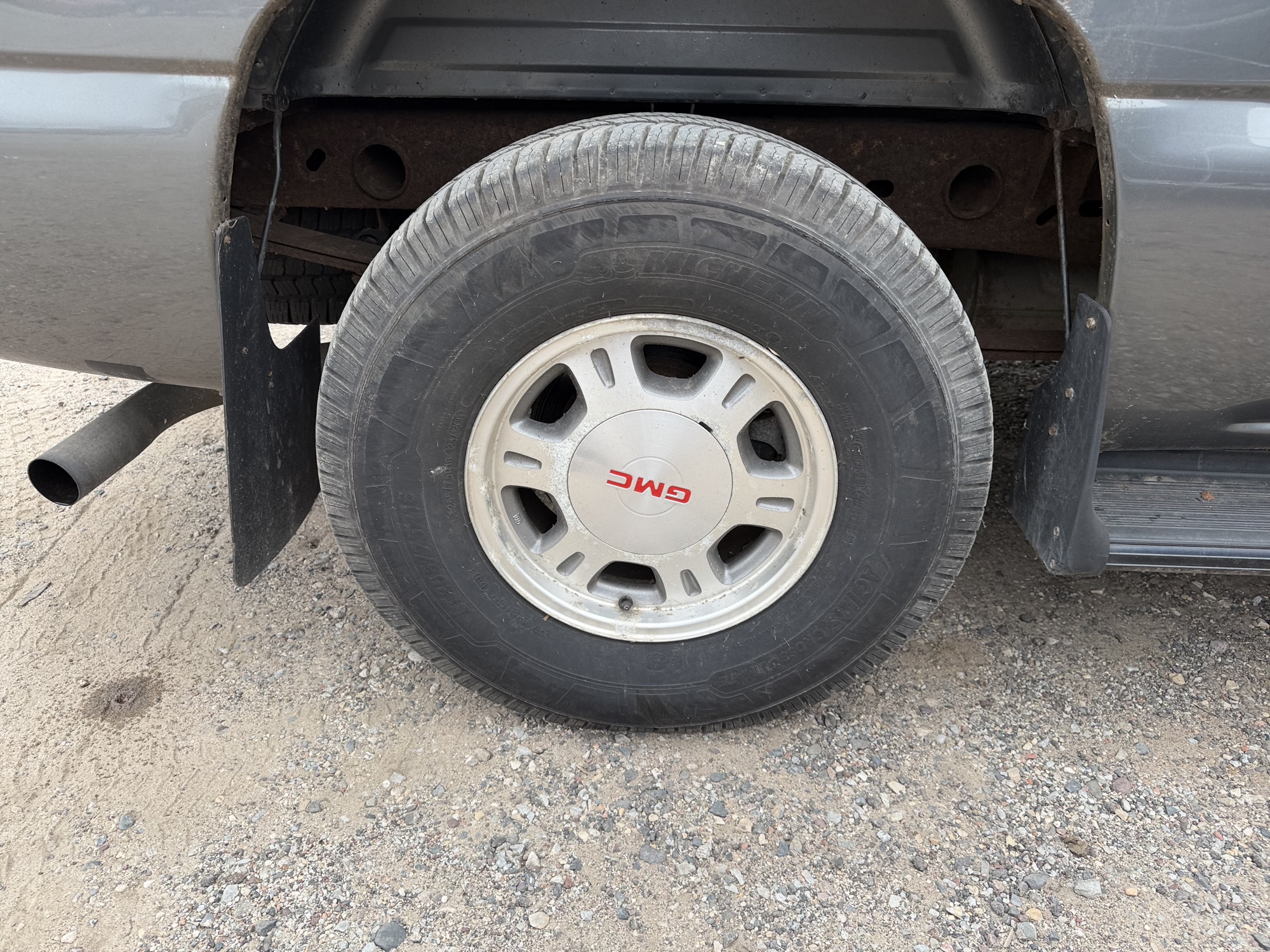 2002 gmc sierra-1500 sl-ext.-cab-short-bed-4wd with 83587 miles for sale near Elk River, Minnesota 106764_14_rear_pass_wheel.jpg
