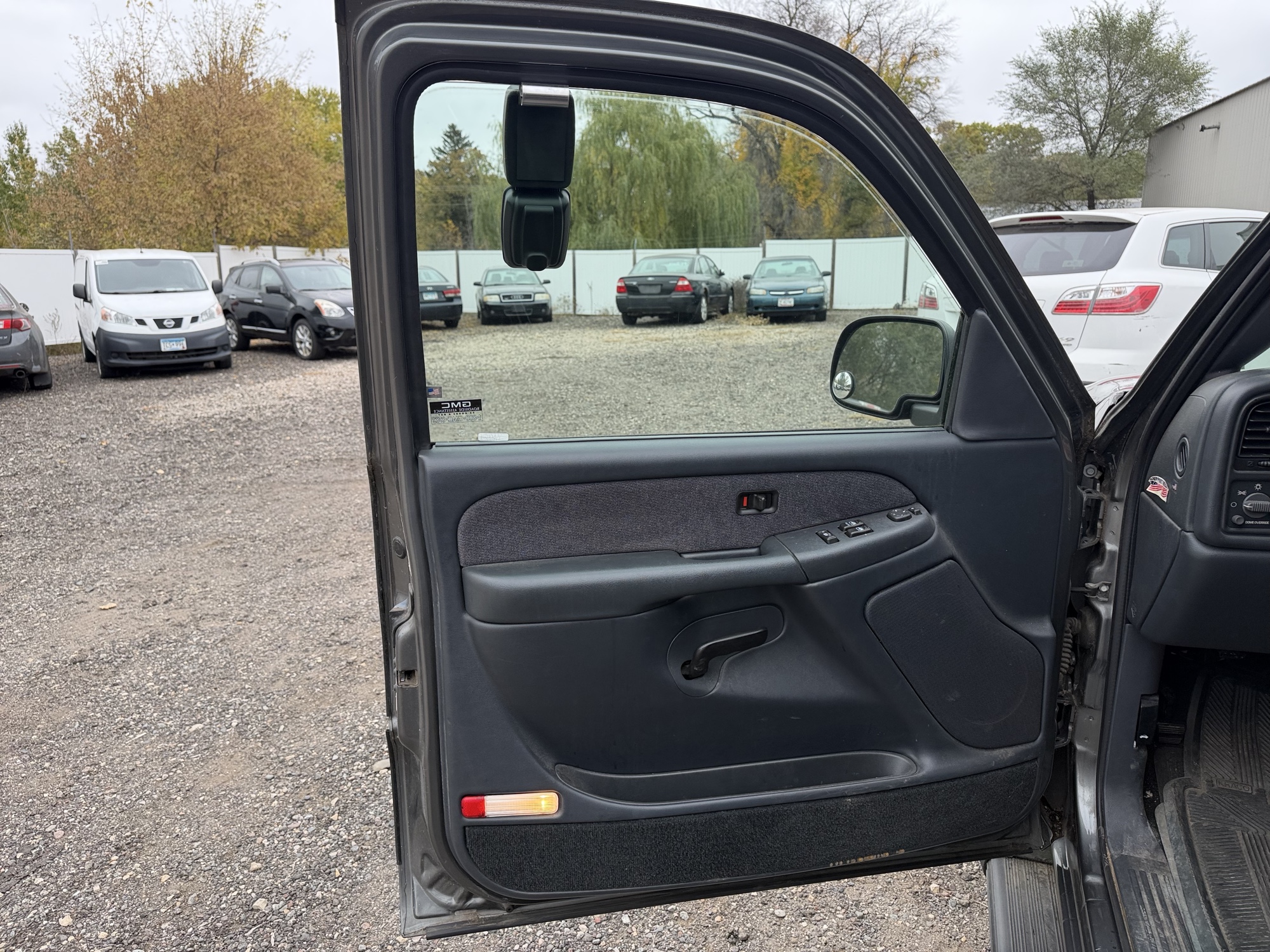 2002 gmc sierra-1500 sl-ext.-cab-short-bed-4wd with 83587 miles for sale near Elk River, Minnesota 106764_23_driver_door_panel.jpg