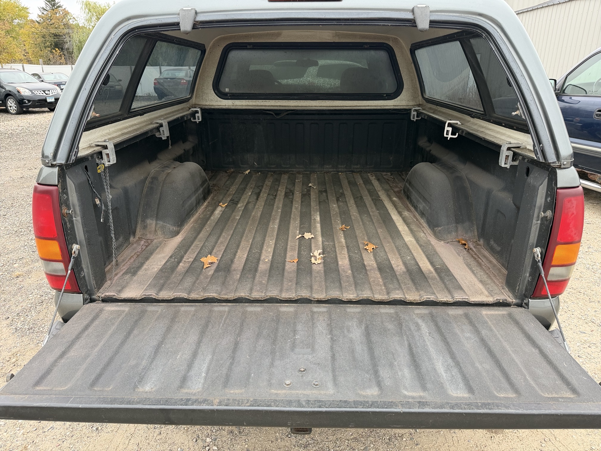 2002 gmc sierra-1500 sl-ext.-cab-short-bed-4wd with 83587 miles for sale near Elk River, Minnesota 106764_26_trunk.jpg
