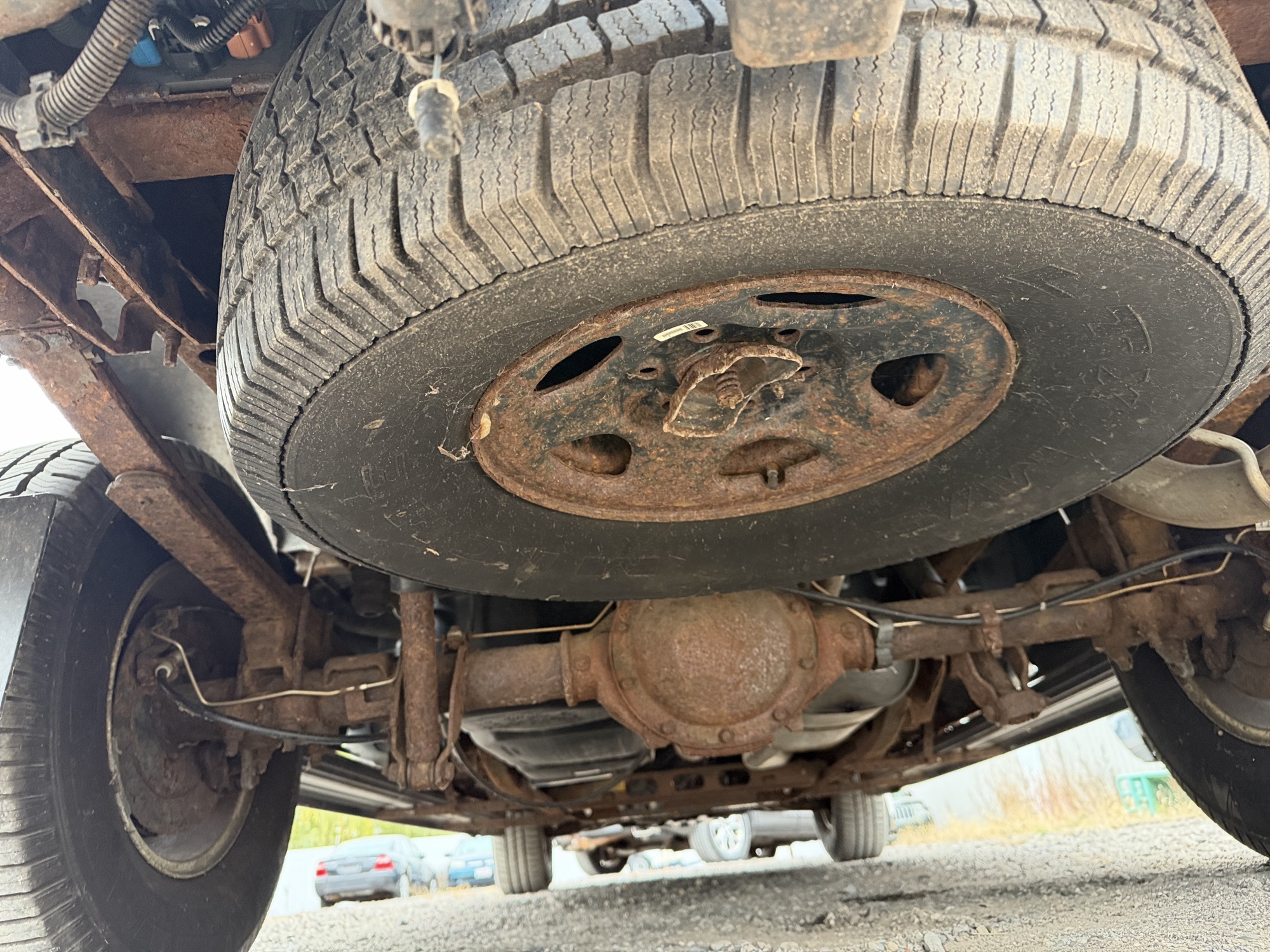 2002 gmc sierra-1500 sl-ext.-cab-short-bed-4wd with 83587 miles for sale near Elk River, Minnesota 106764_27_spare_tire.jpg