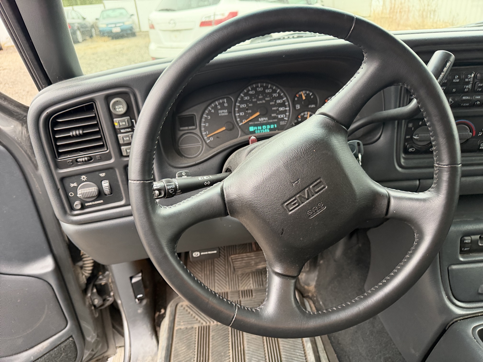 2002 gmc sierra-1500 sl-ext.-cab-short-bed-4wd with 83587 miles for sale near Elk River, Minnesota 106764_36_steering_wheel.jpg