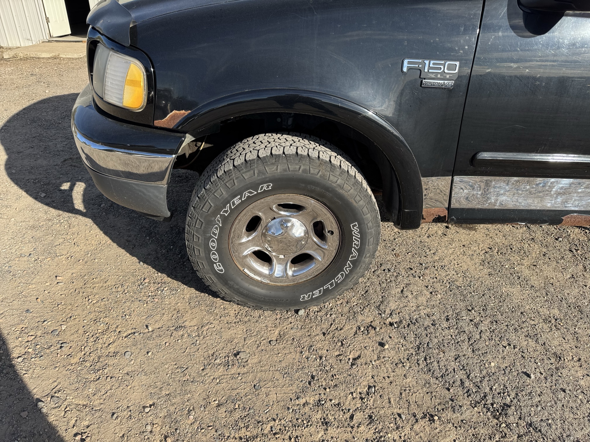 1999 ford f-150 ws-supercab-short-bed-4wd with 245575 miles for sale near Elk River, Minnesota 106765_12_drv_front_wheel.jpg