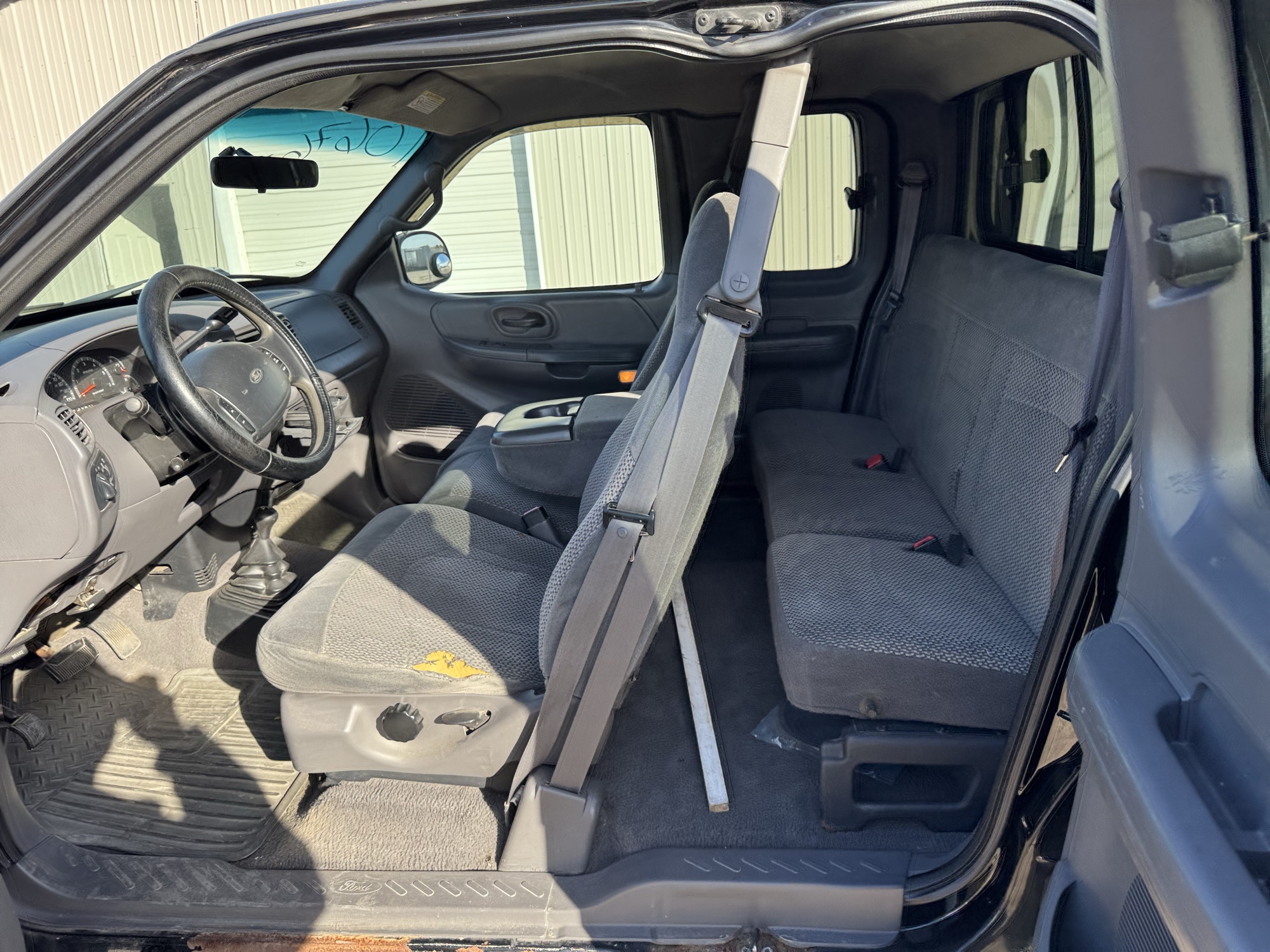 1999 ford f-150 ws-supercab-short-bed-4wd with 245575 miles for sale near Elk River, Minnesota 106765_24_drv_rear_seat.jpg