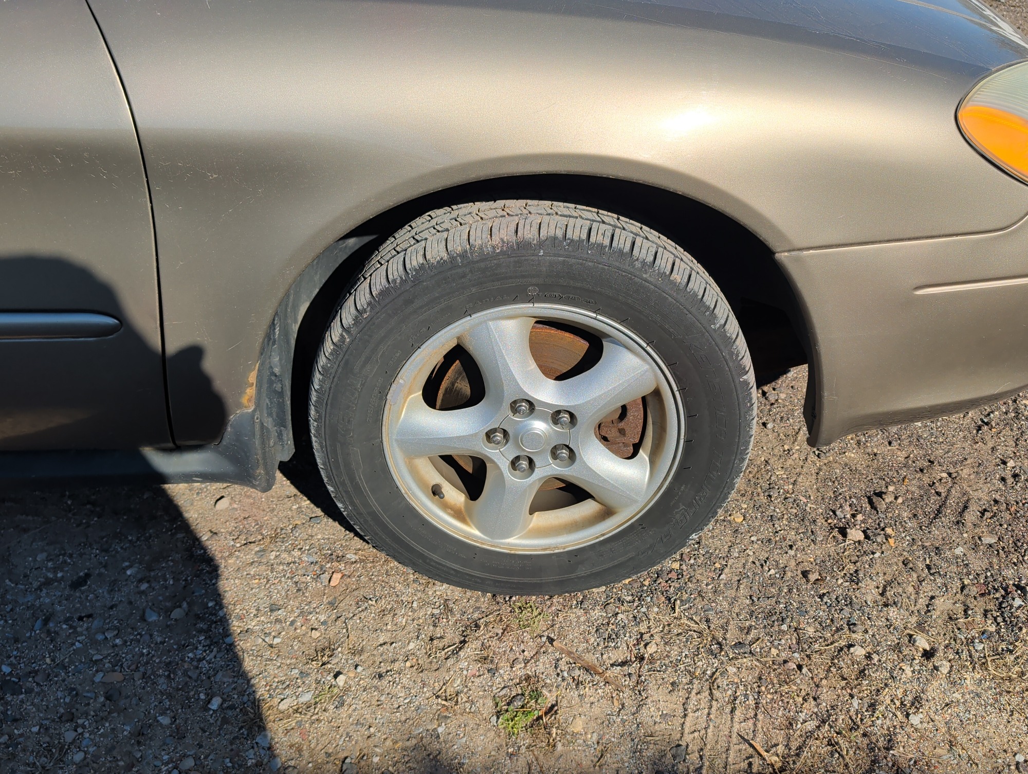 2003 ford taurus se with 156421 miles for sale near Elk River, Minnesota 106777_15_front_pass_wheel.jpg
