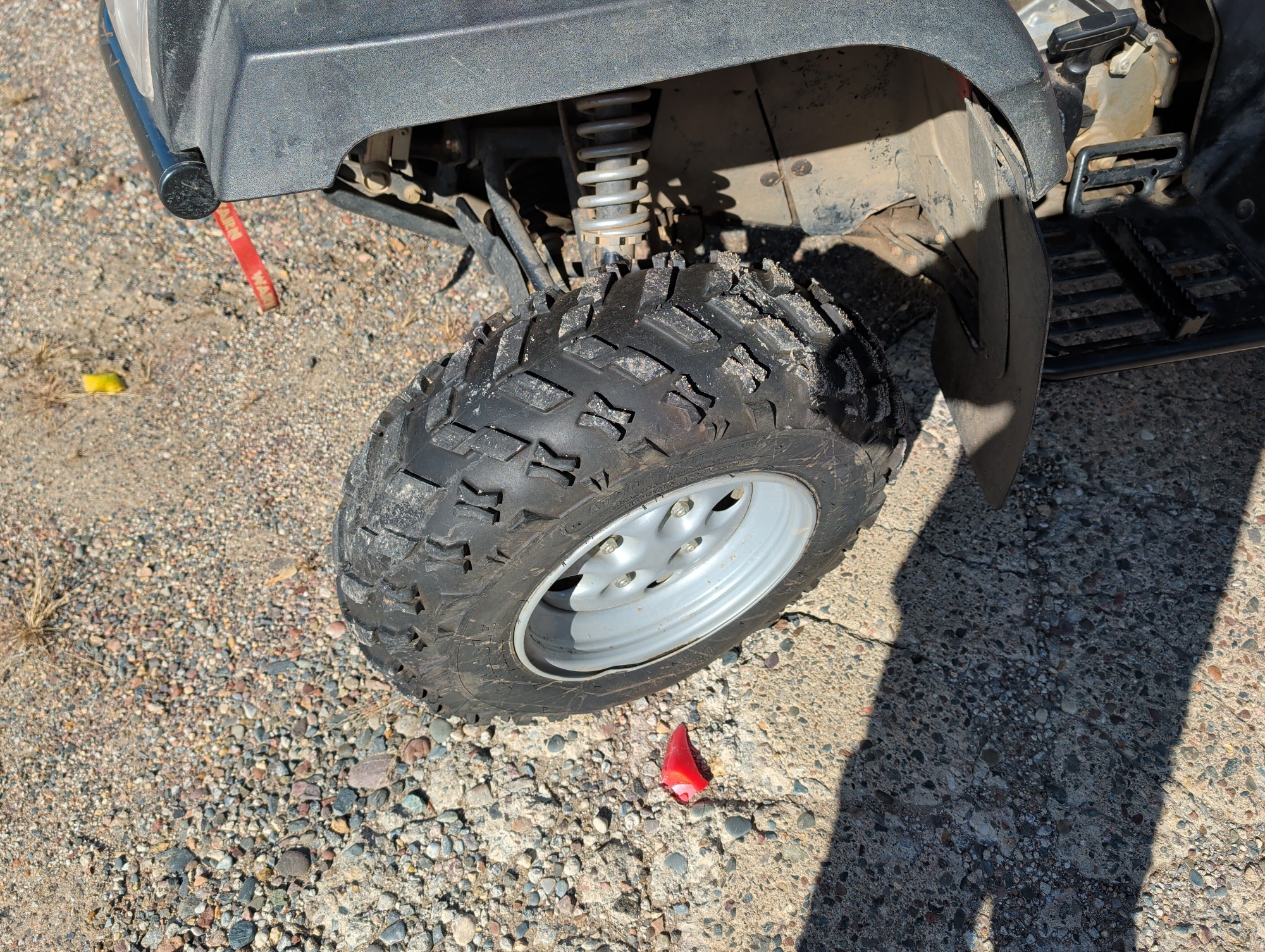2004 arctic-cat 400-4x4 with 1294 miles for sale near Elk River, Minnesota 106781_12_drv_front_wheel.jpg