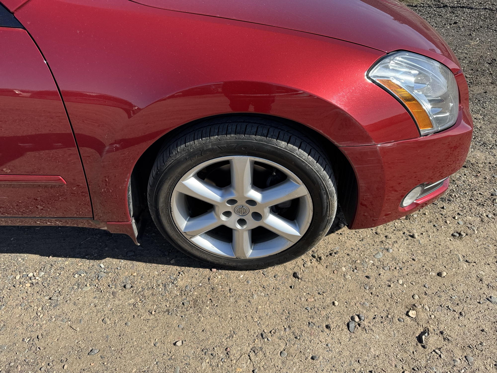 2004 nissan maxima se with 64495 miles for sale near Elk River, Minnesota 106792_15_front_pass_wheel.jpg