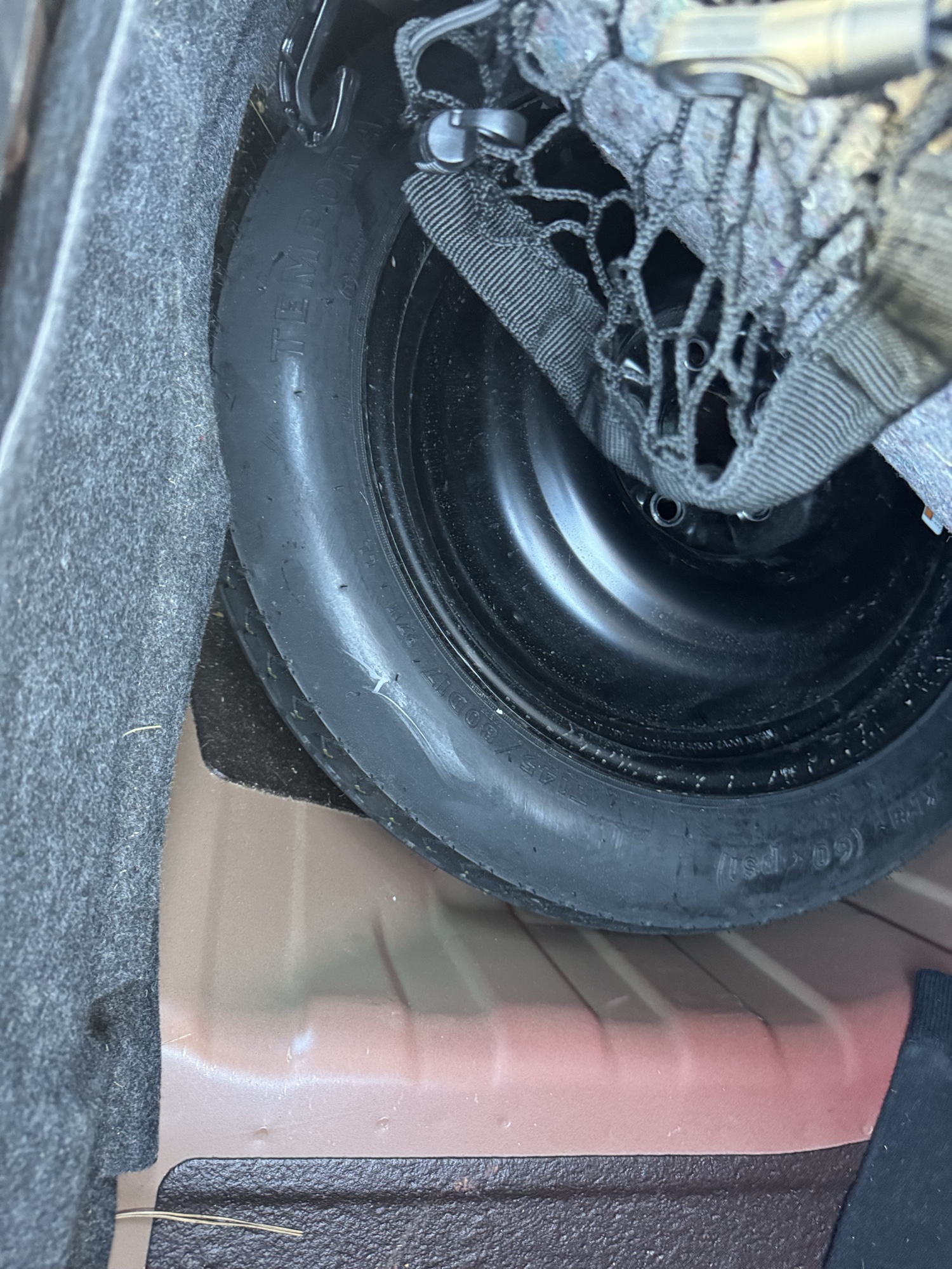 2004 nissan maxima se with 64495 miles for sale near Elk River, Minnesota 106792_27_spare_tire.jpg