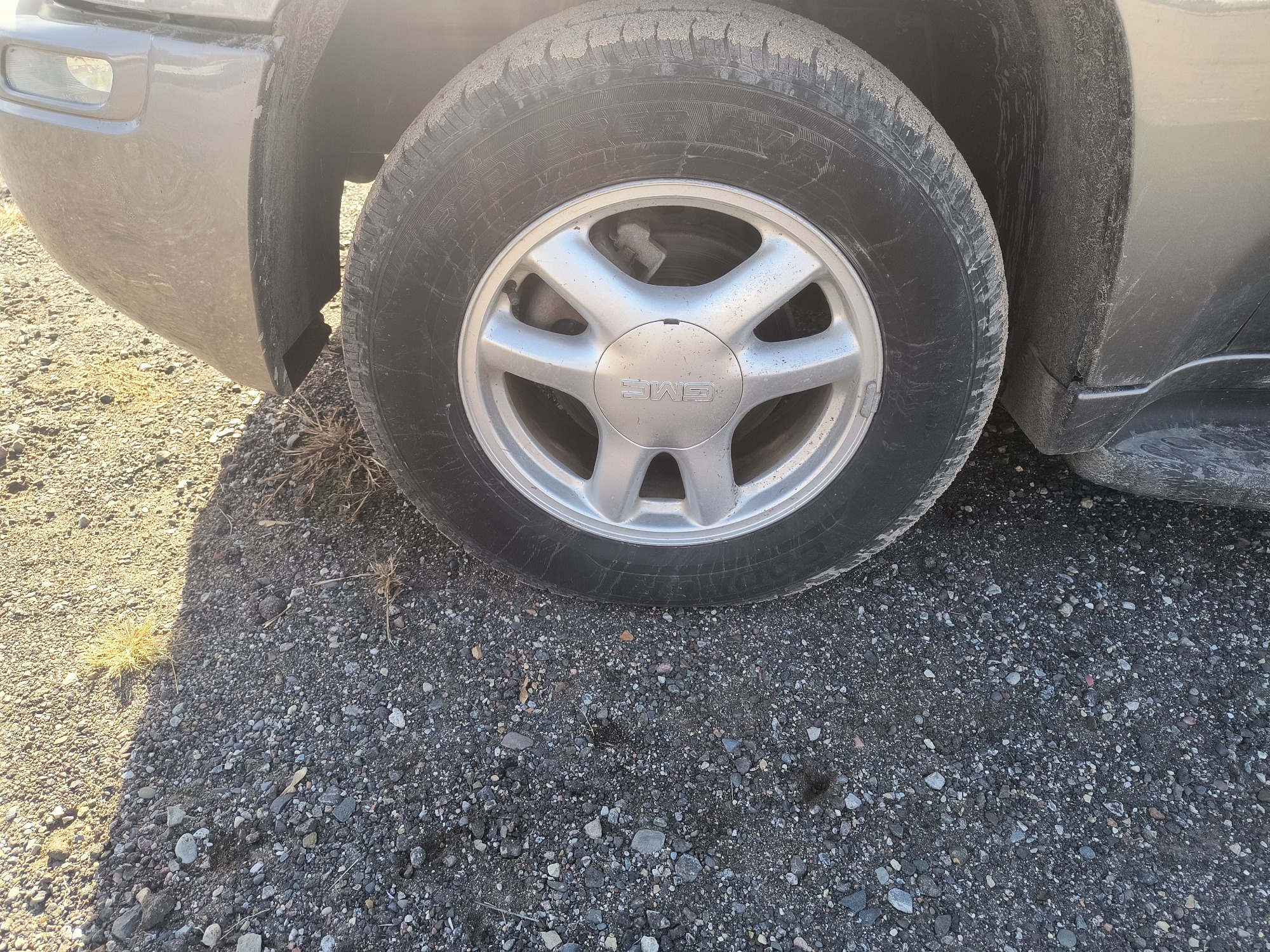 2006 gmc envoy sle-4wd with 210208 miles for sale near Elk River, Minnesota 106796_12_drv_front_wheel.jpg