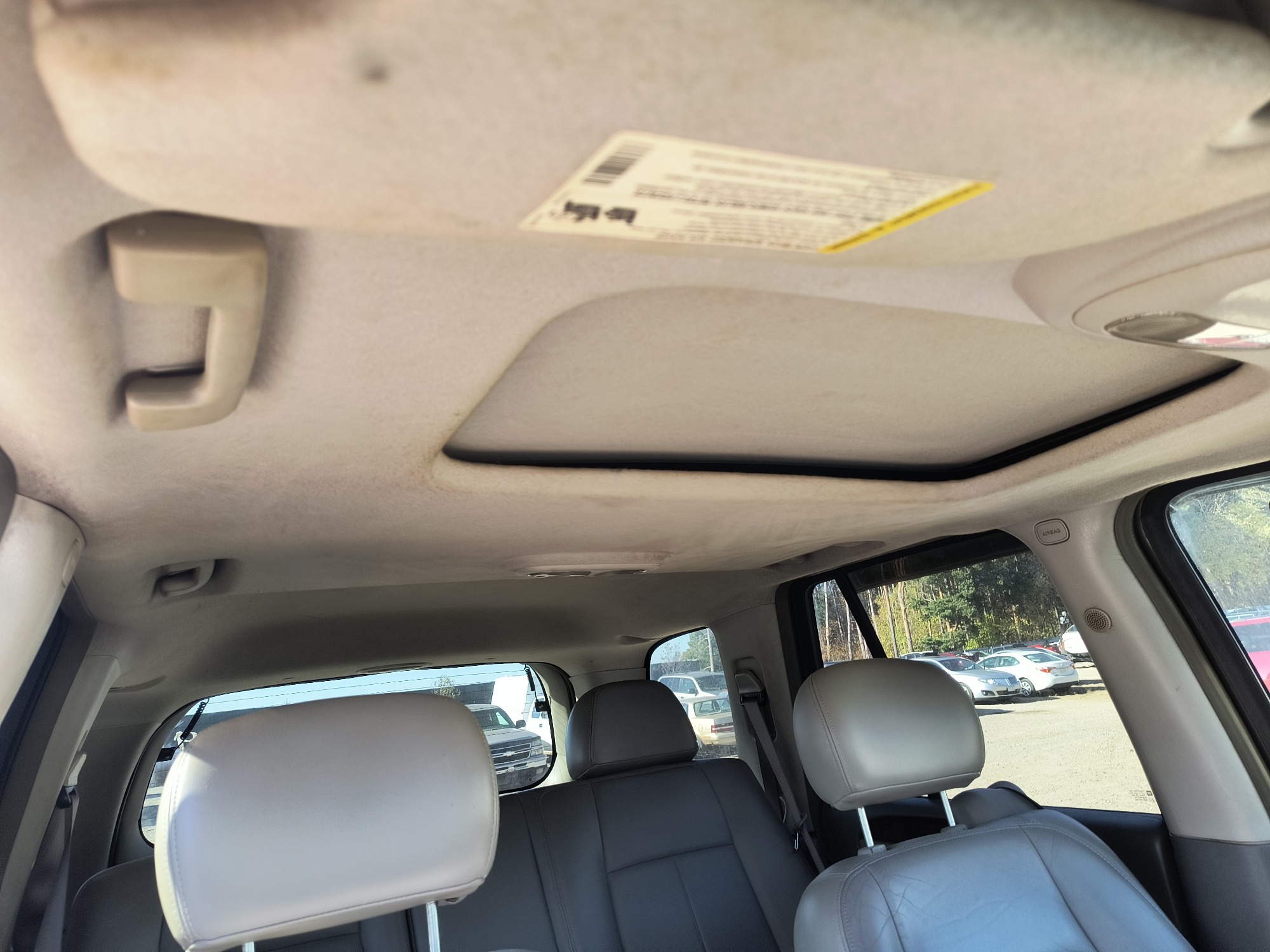 2006 gmc envoy sle-4wd with 210208 miles for sale near Elk River, Minnesota 106796_35_headliner_sunroof.jpg