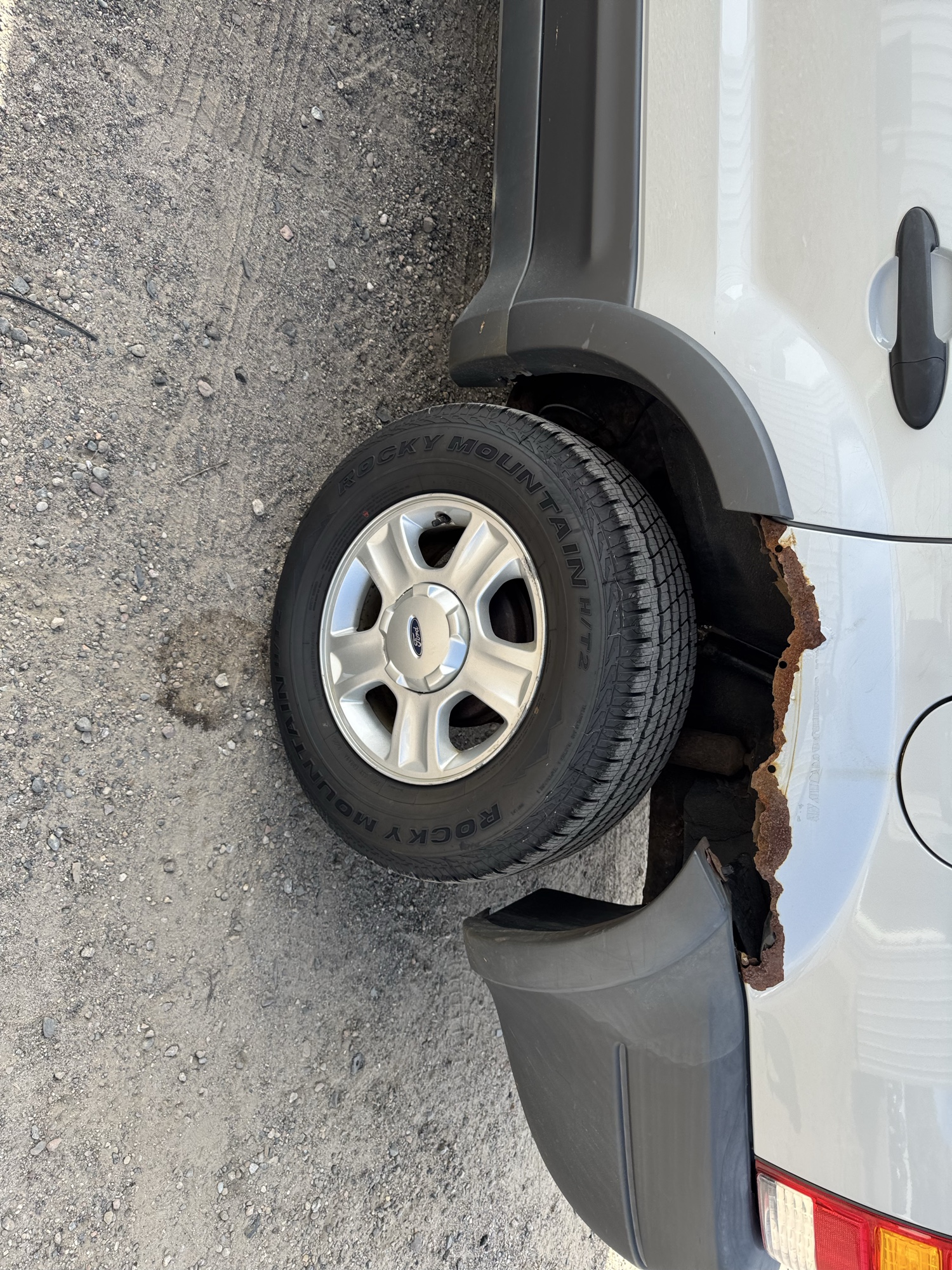2002 ford escape xlt-choice-4wd with 133830 miles for sale near Elk River, Minnesota 106797_13_rear_drv_wheel.jpg