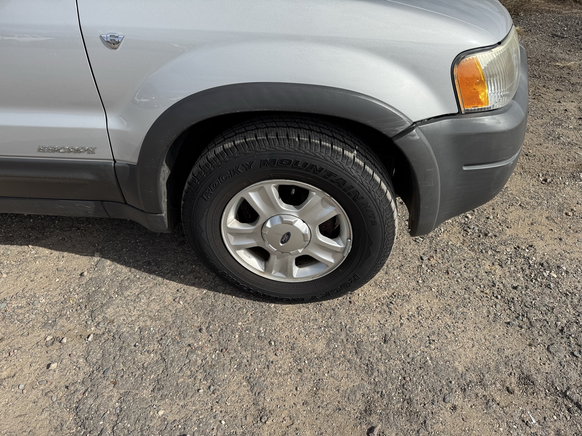 2002 ford escape xlt-choice-4wd with 133830 miles for sale near Elk River, Minnesota 106797_15_front_pass_wheel.jpg