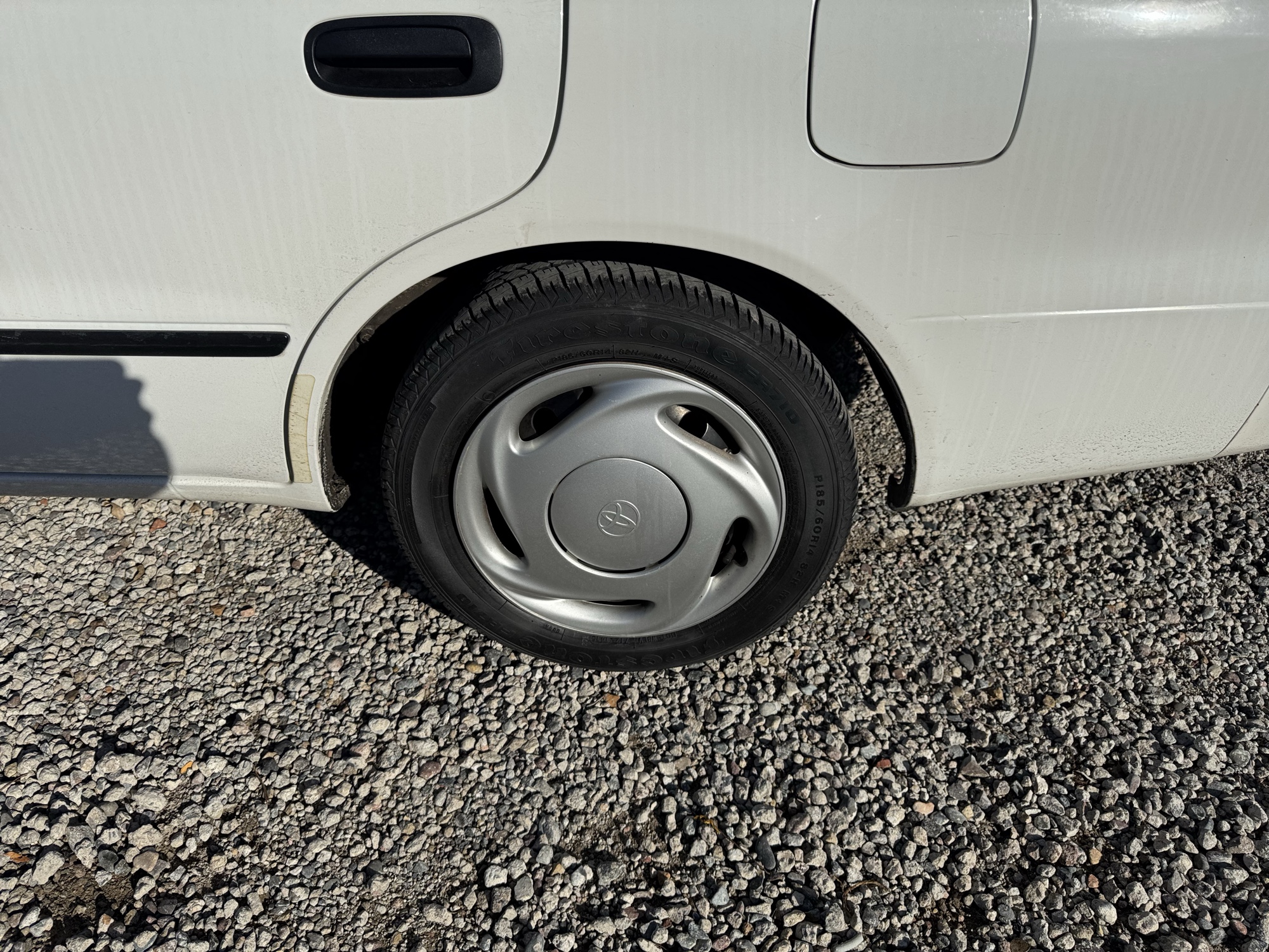 2000 toyota corolla ve with 73258 miles for sale near Elk River, Minnesota 106807_13_rear_drv_wheel.jpg