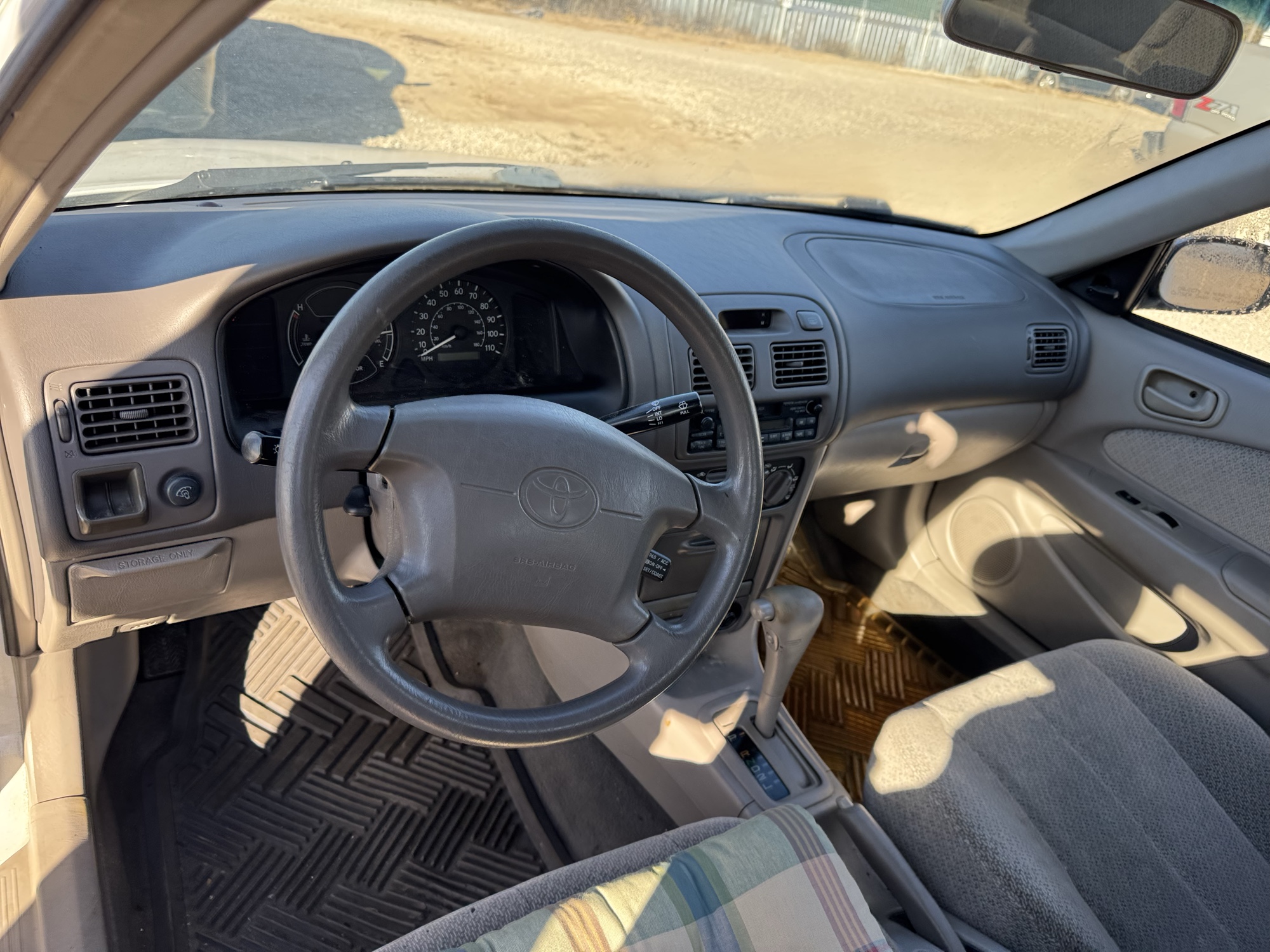 2000 toyota corolla ve with 73258 miles for sale near Elk River, Minnesota 106807_33_dash_from_driver.jpg