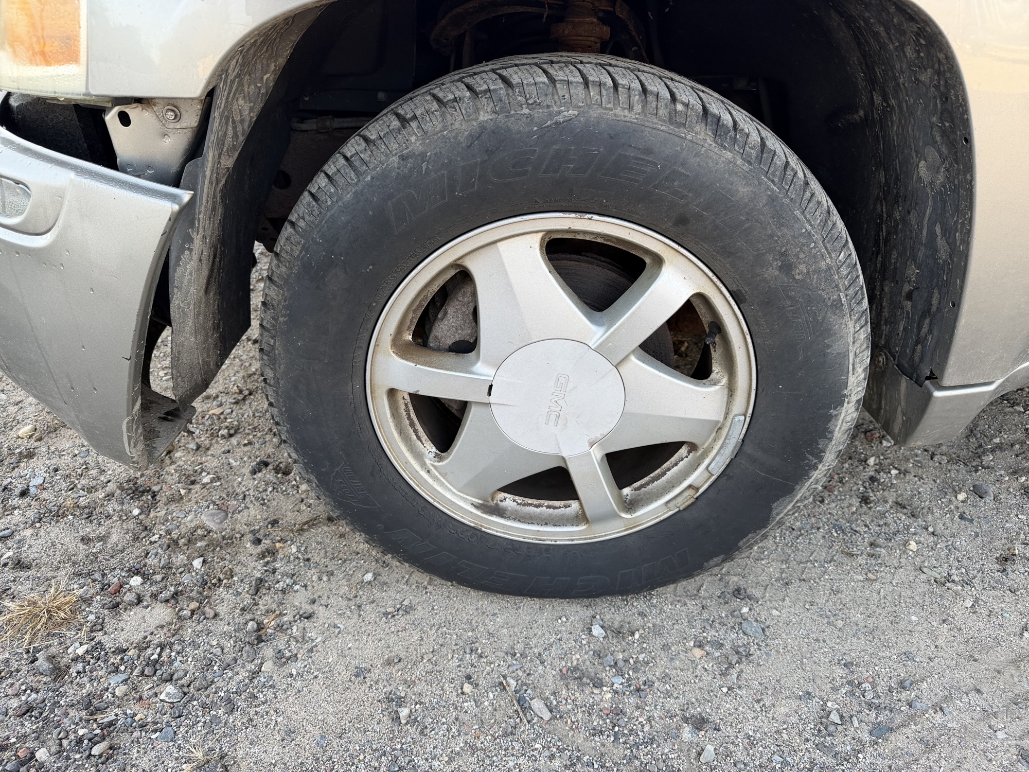 2002 gmc envoy sle-4wd with 221103 miles for sale near Elk River, Minnesota 106812_12_drv_front_wheel.jpg