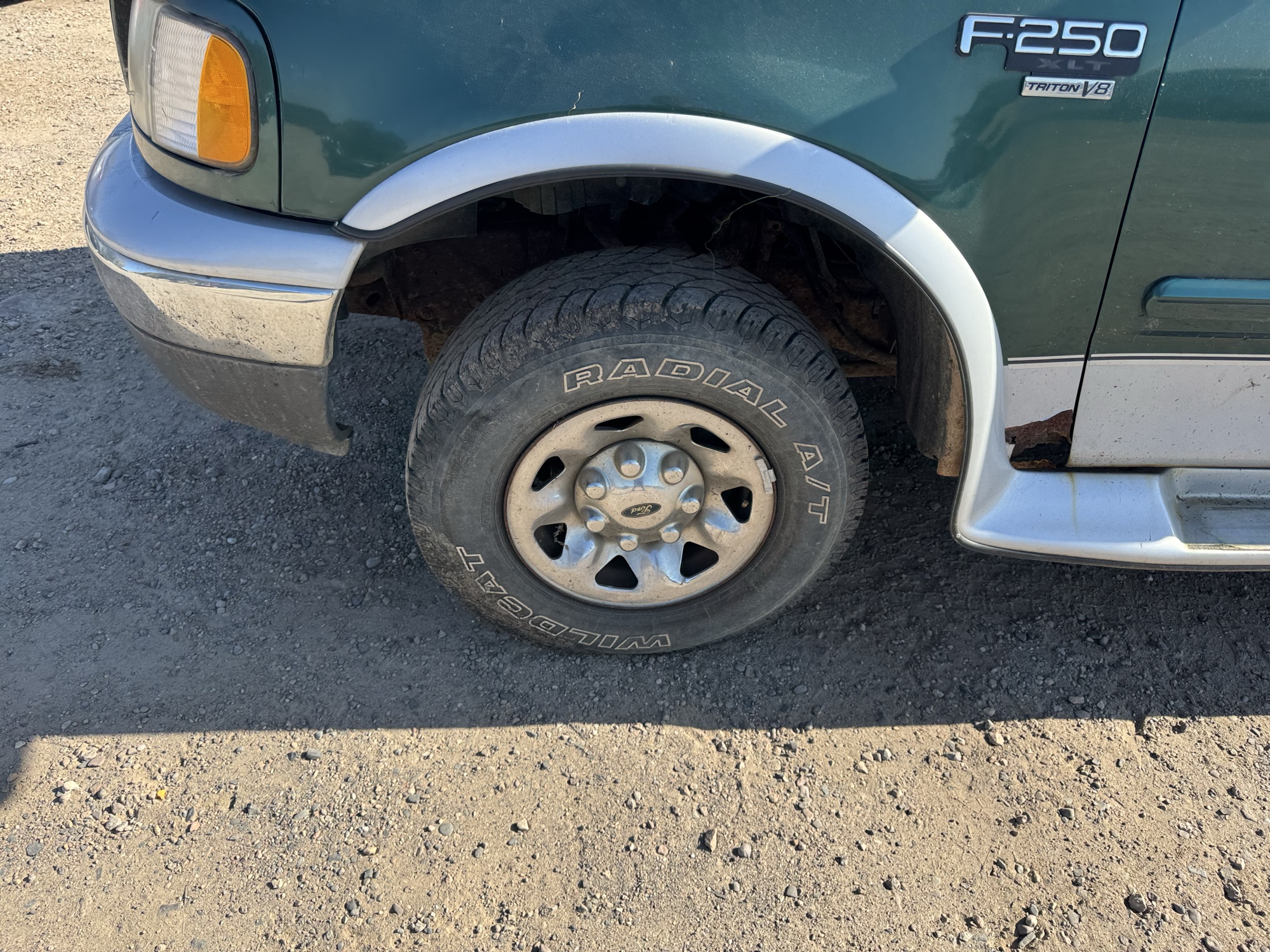1999 ford f-250 ws-reg.-cab-4wd for sale near Elk River, Minnesota 106816_12_drv_front_wheel.jpg