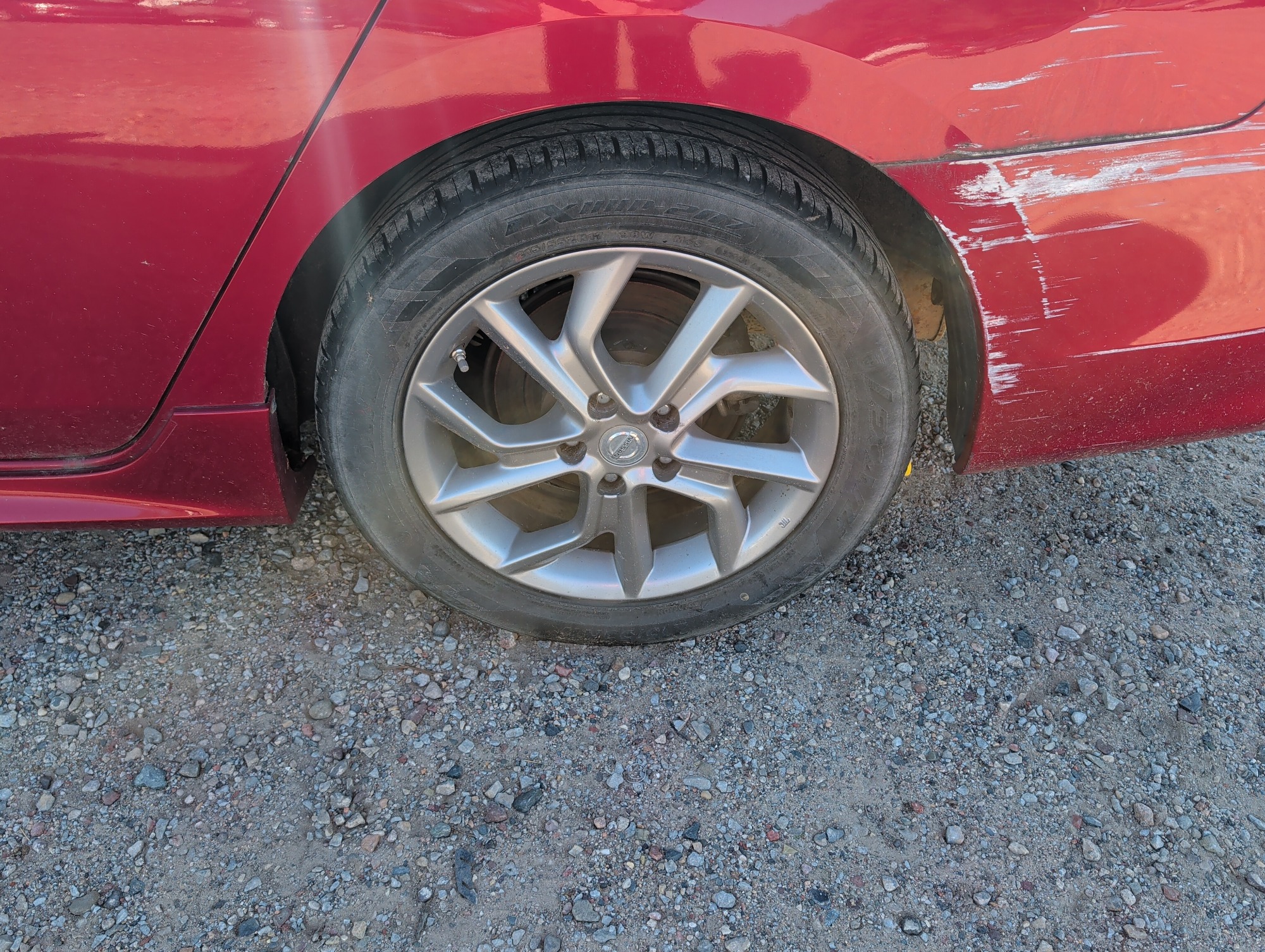2013 nissan sentra s-6mt with 130137 miles for sale near Elk River, Minnesota 106822_13_rear_drv_wheel.jpg
