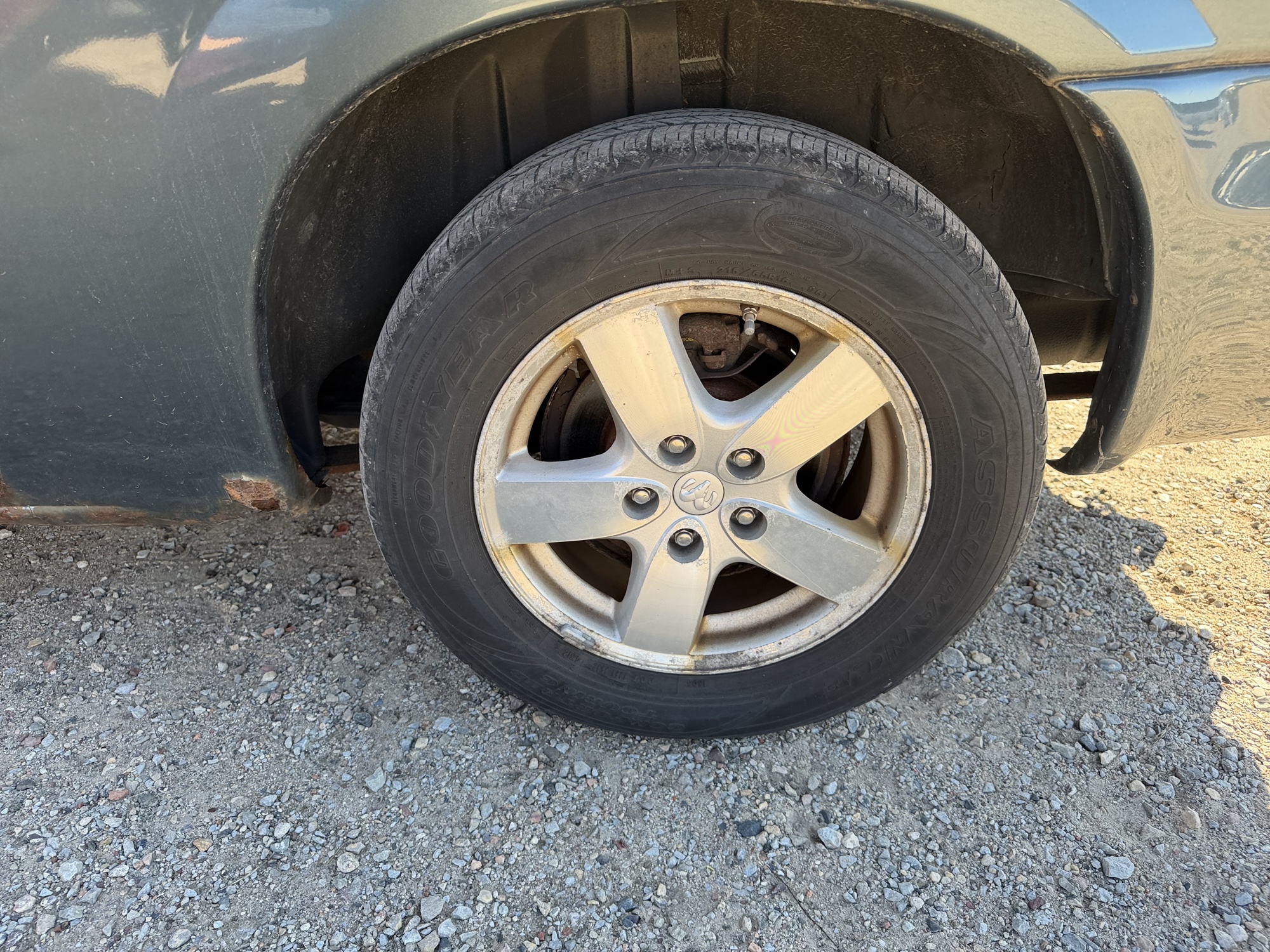 2007 dodge grand-caravan sxt with 169997 miles for sale near Elk River, Minnesota 106825_13_rear_drv_wheel.jpg