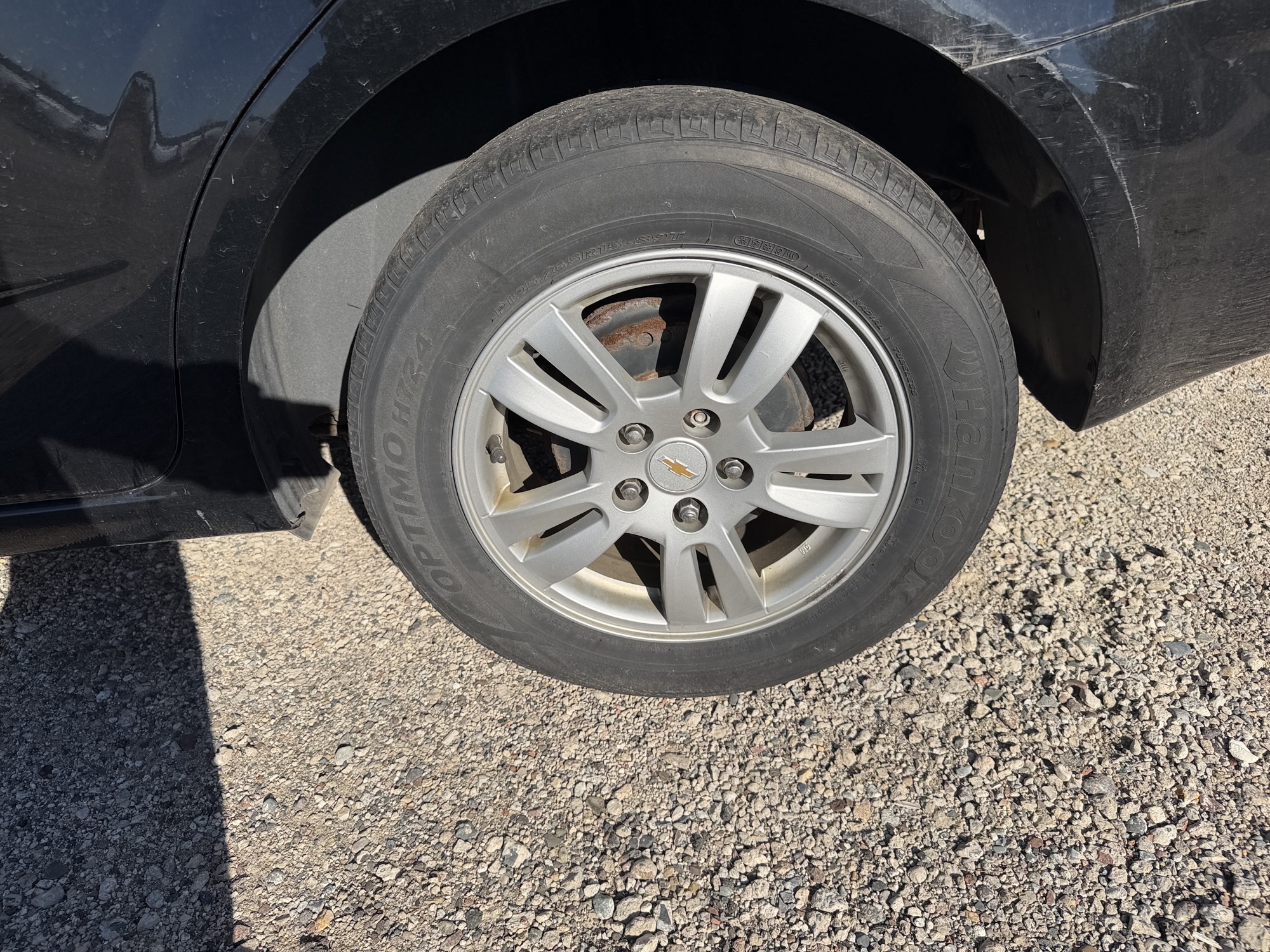 2012 chevrolet sonic 1ls-sedan for sale near Elk River, Minnesota 106826_13_rear_drv_wheel.jpg