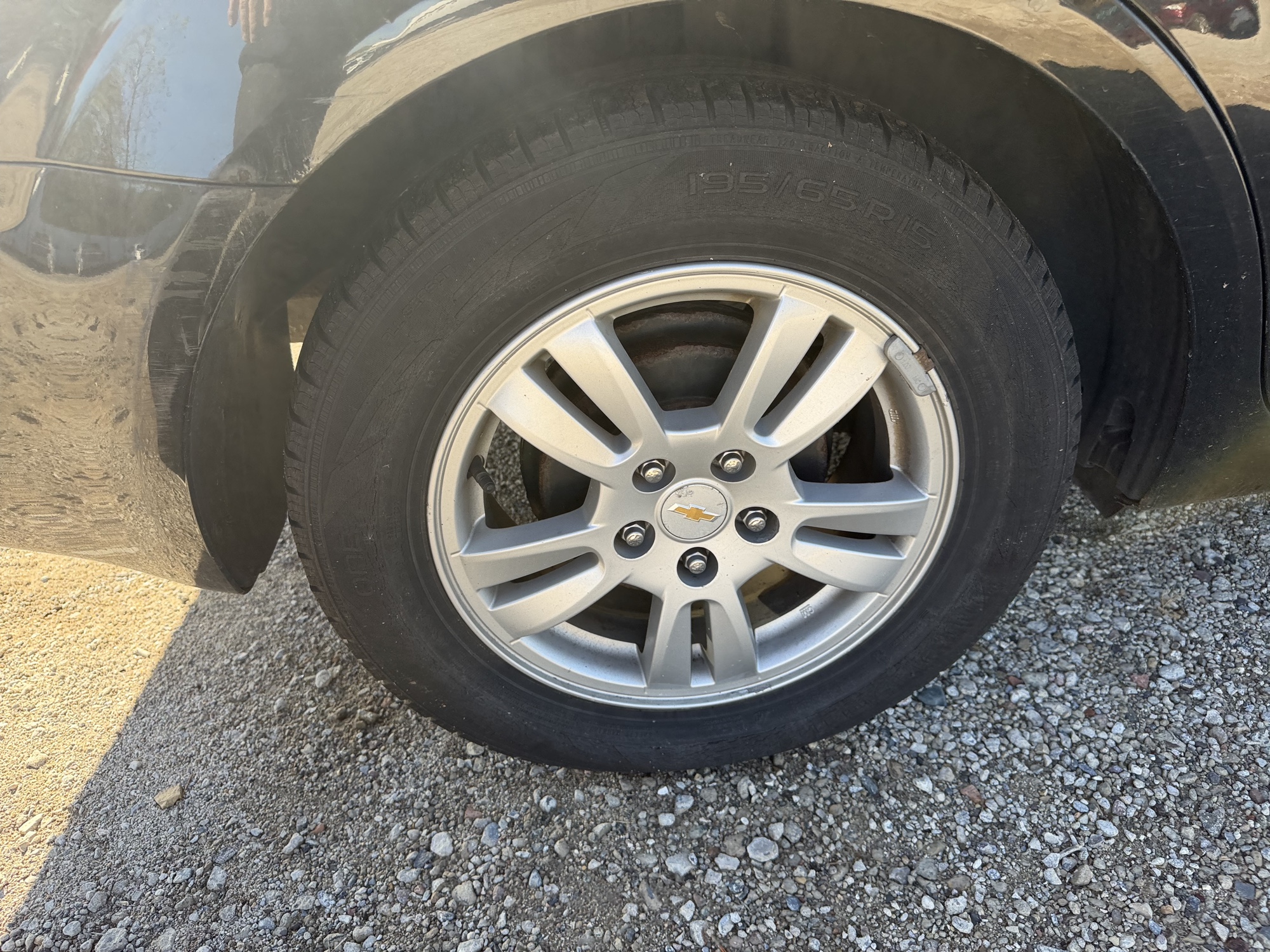 2012 chevrolet sonic 1ls-sedan for sale near Elk River, Minnesota 106826_14_rear_pass_wheel.jpg