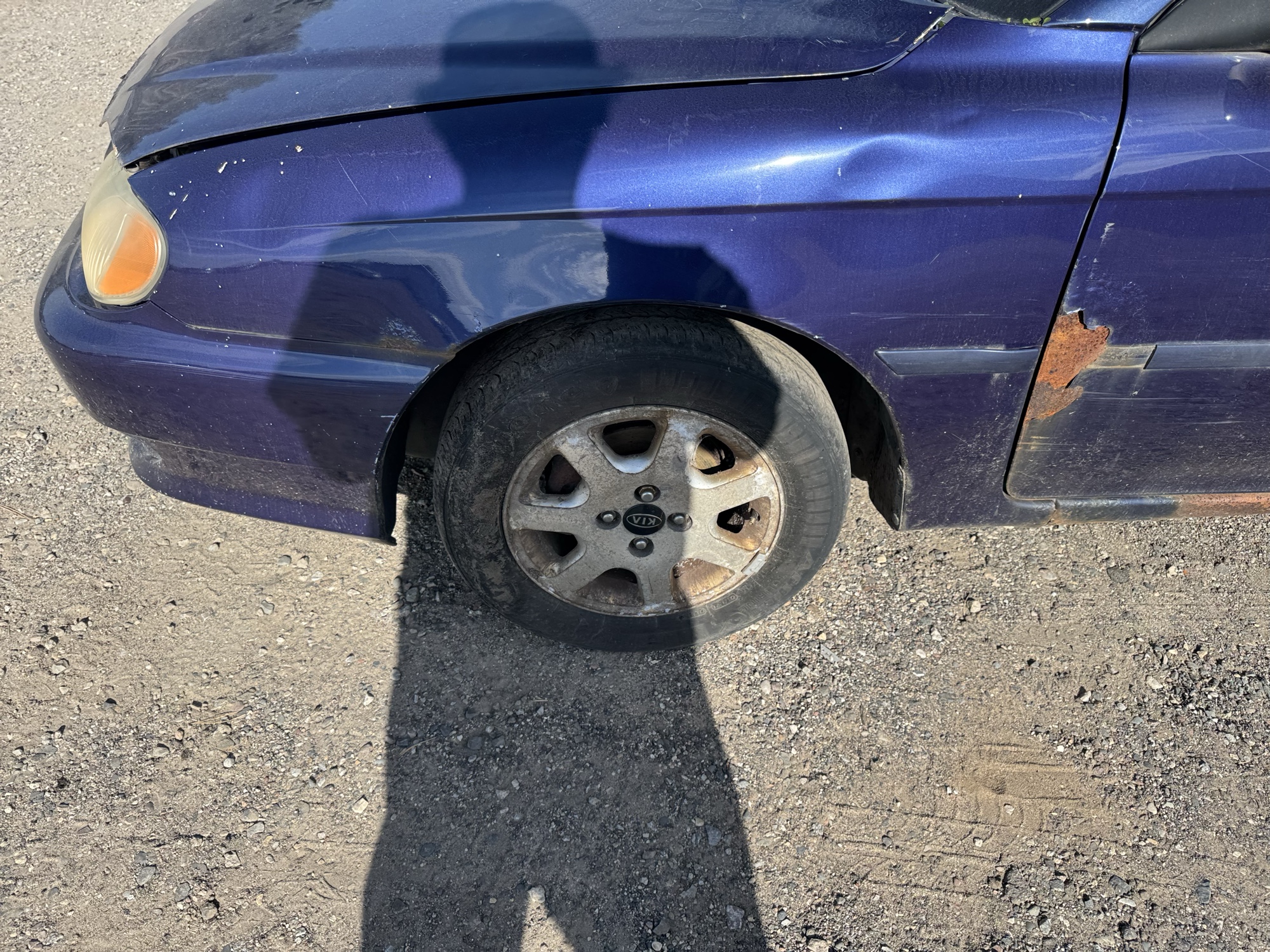 1999 kia sephia base with 167933 miles for sale near Elk River, Minnesota 106832_12_drv_front_wheel.jpg
