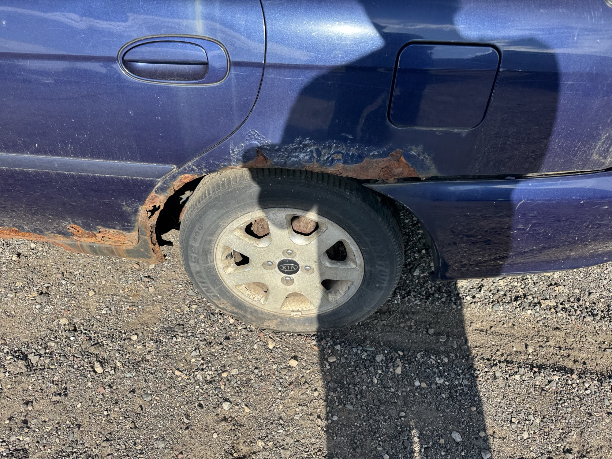1999 kia sephia base with 167933 miles for sale near Elk River, Minnesota 106832_13_rear_drv_wheel.jpg