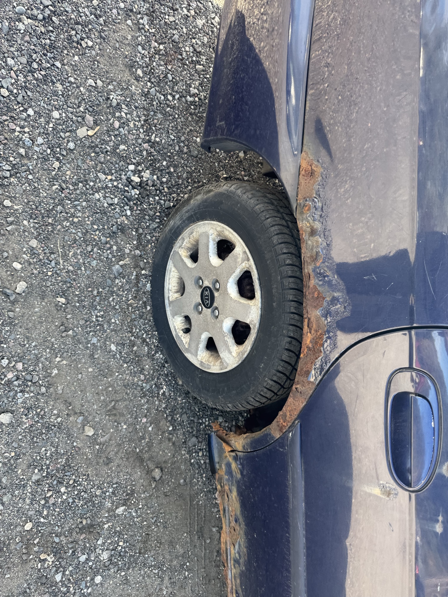 1999 kia sephia base with 167933 miles for sale near Elk River, Minnesota 106832_14_rear_pass_wheel.jpg
