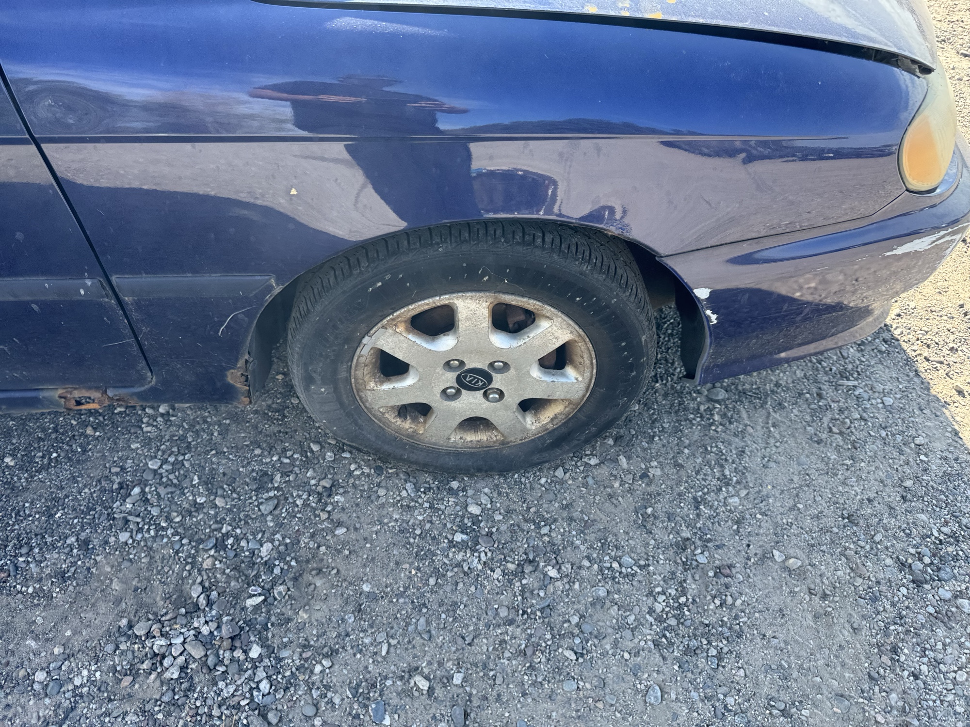 1999 kia sephia base with 167933 miles for sale near Elk River, Minnesota 106832_15_front_pass_wheel.jpg