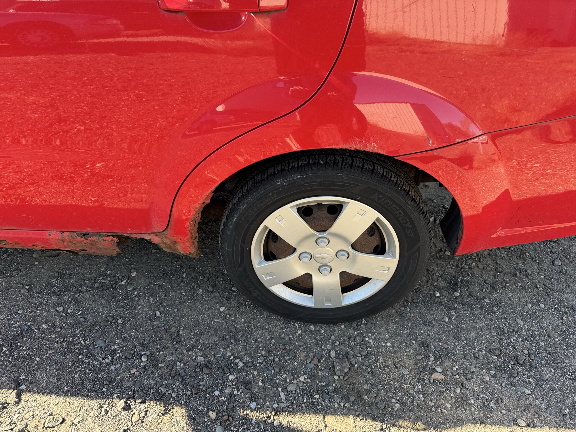2008 chevrolet aveo ls-4-door with 84060 miles for sale near Elk River, Minnesota 106834_13_rear_drv_wheel.jpg