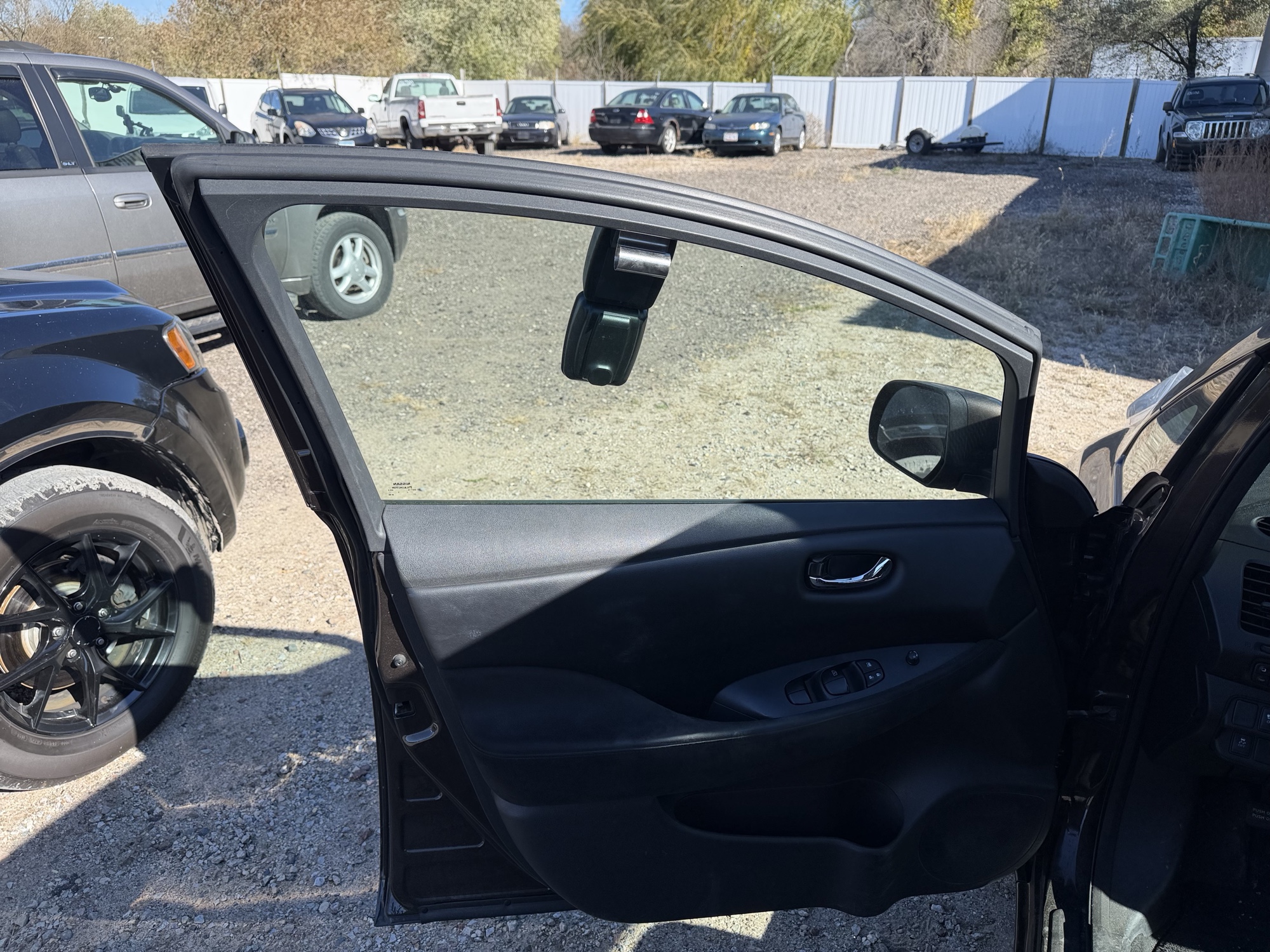 2016 nissan leaf sl with 82655 miles for sale near Elk River, Minnesota 106835_23_driver_door_panel.jpg