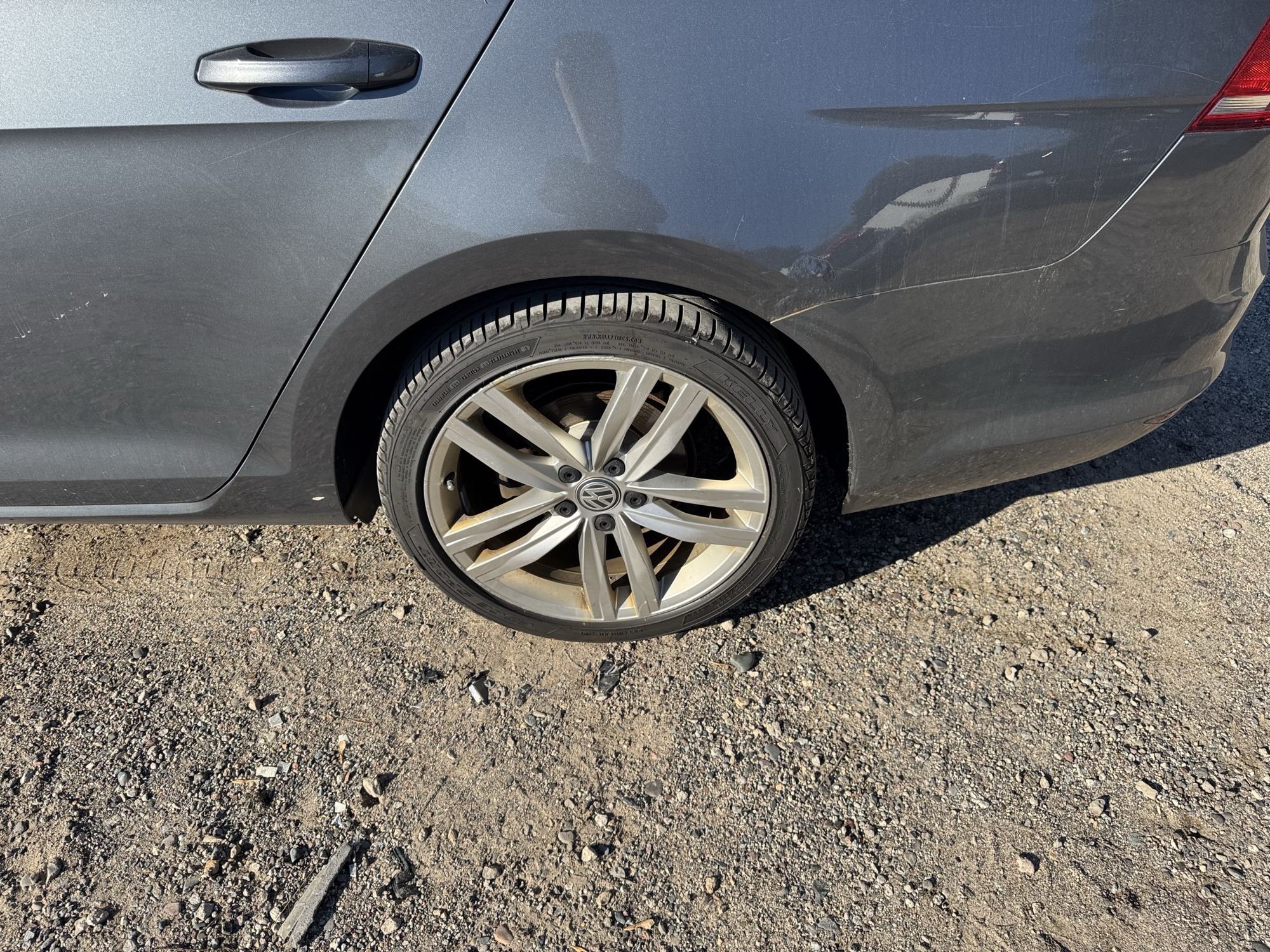 2015 volkswagen golf-sportwagen tsi-s-6a with 186366 miles for sale near Elk River, Minnesota 106840_13_rear_drv_wheel.jpg