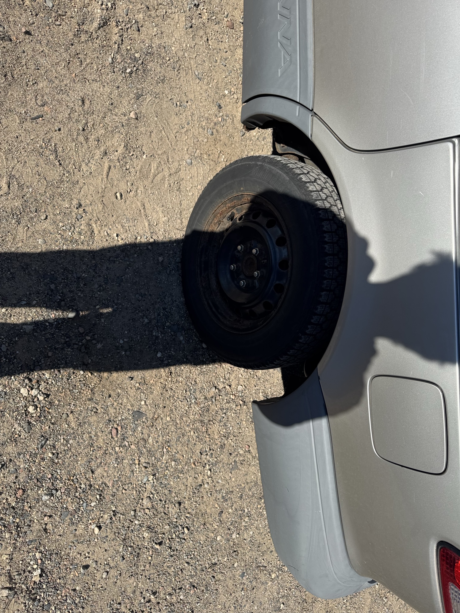 2002 toyota sienna le with 98994 miles for sale near Elk River, Minnesota 106842_13_rear_drv_wheel.jpg
