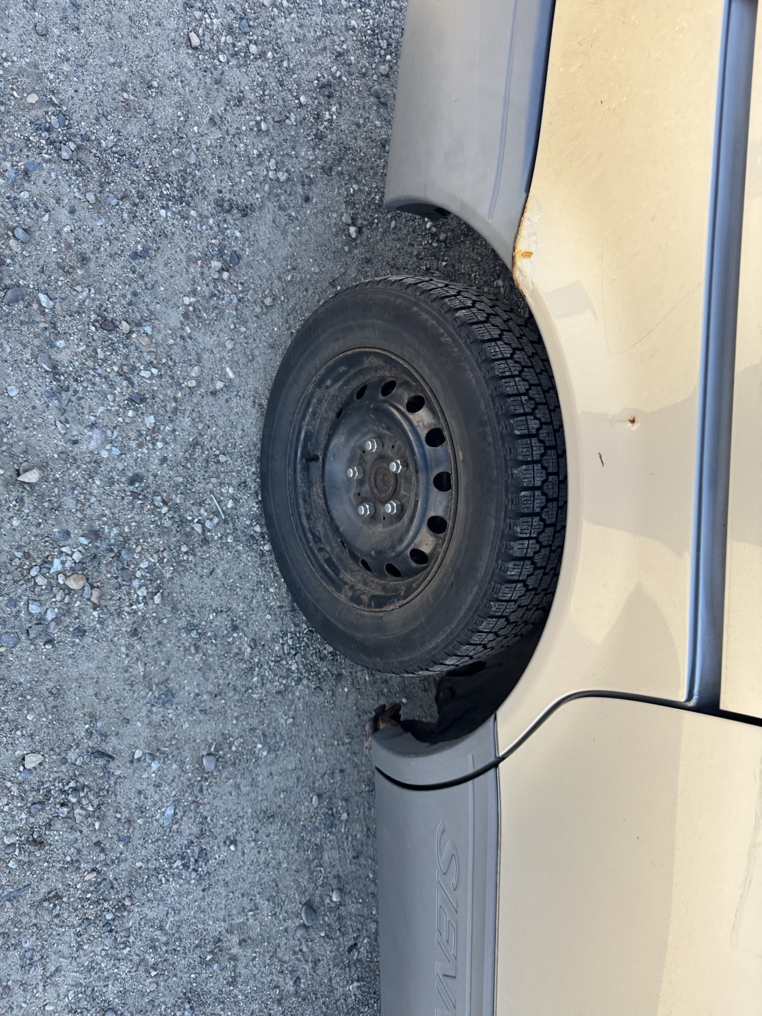 2002 toyota sienna le with 98994 miles for sale near Elk River, Minnesota 106842_14_rear_pass_wheel.jpg