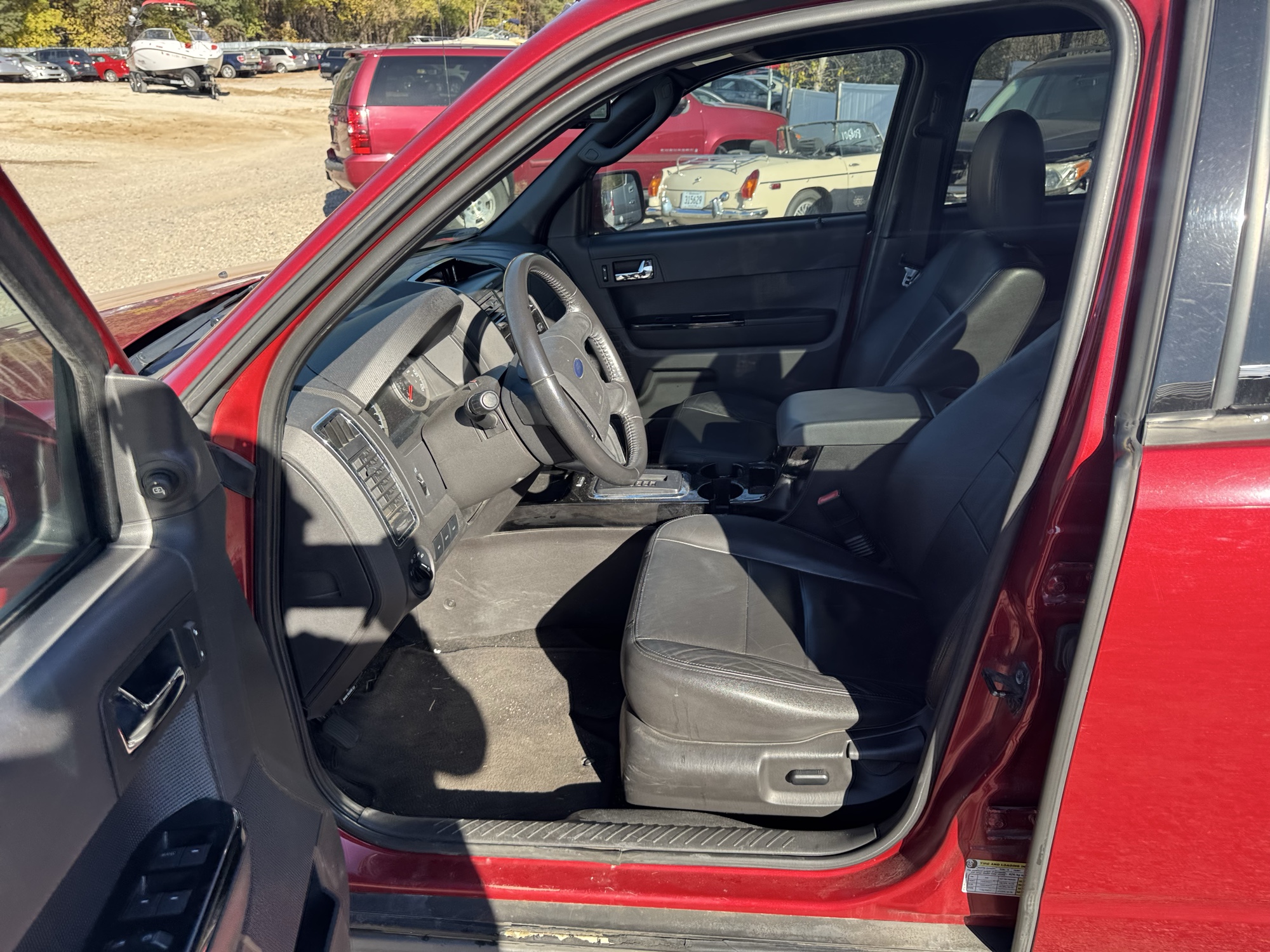 2009 ford escape limited-4wd-v6 with 171099 miles for sale near Elk River, Minnesota 106844_22_driver_seat.jpg